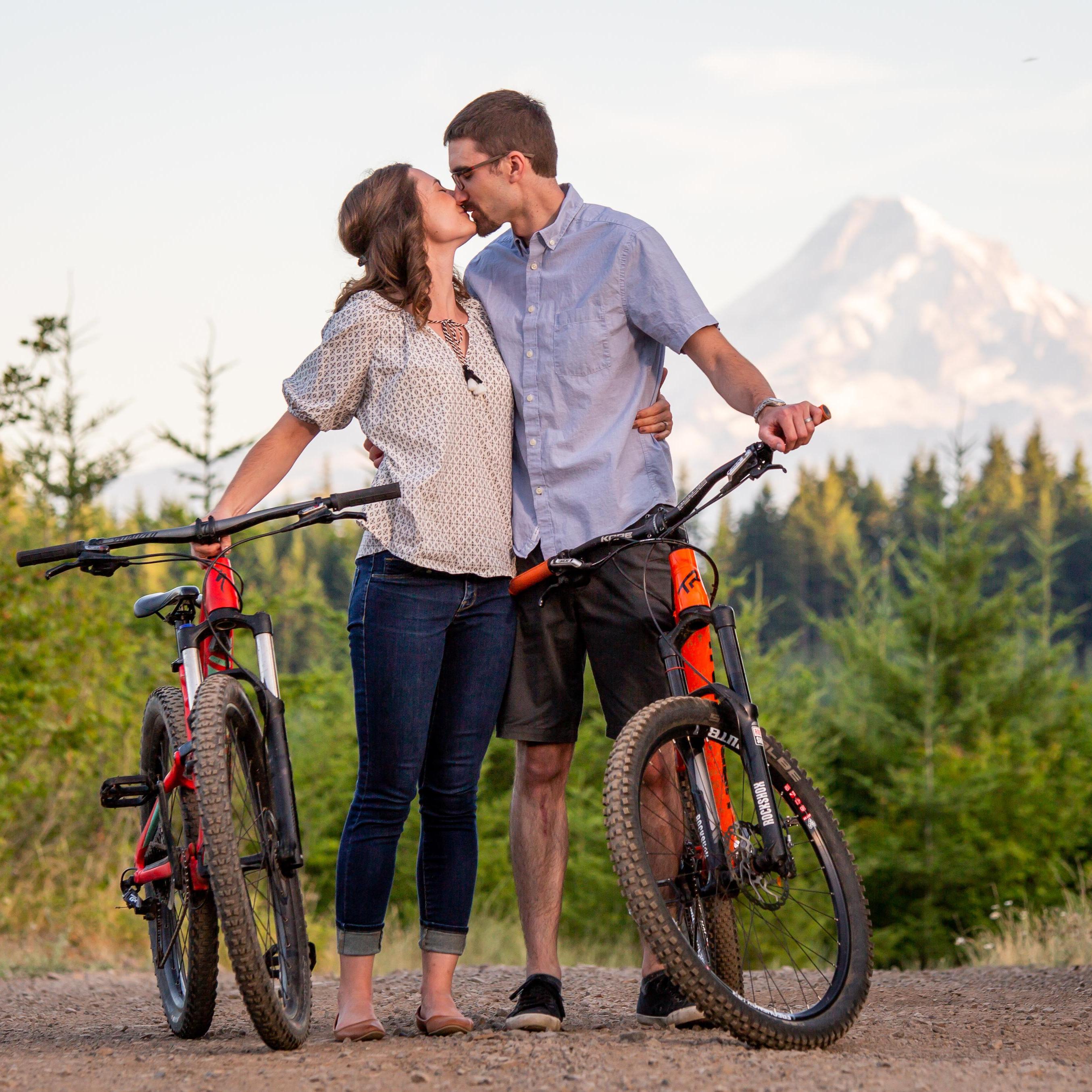 fun engagement photos at a mountain biking area in Hood River, Oregon