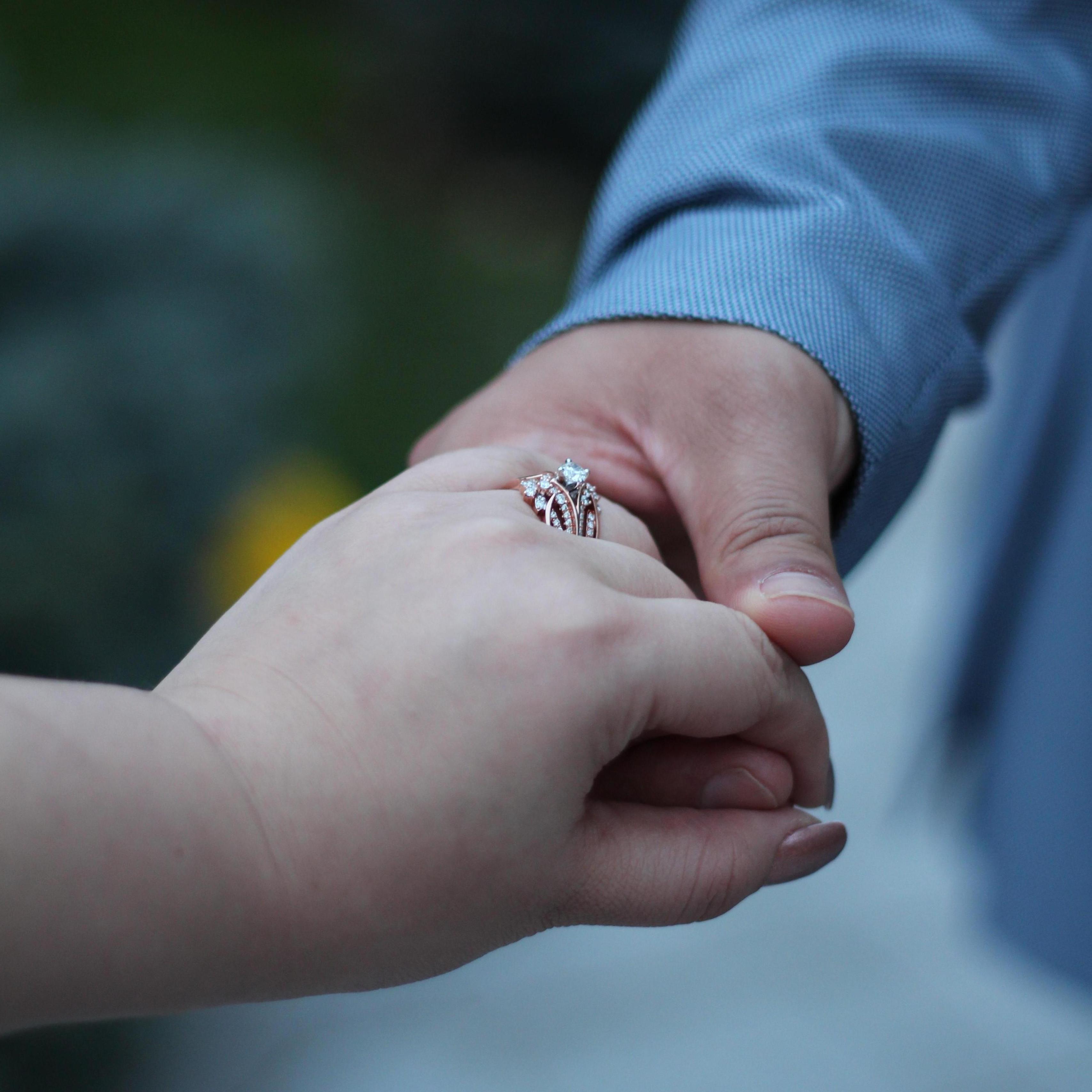 Its beautiful the hand, the palm, the finger and the ring...
