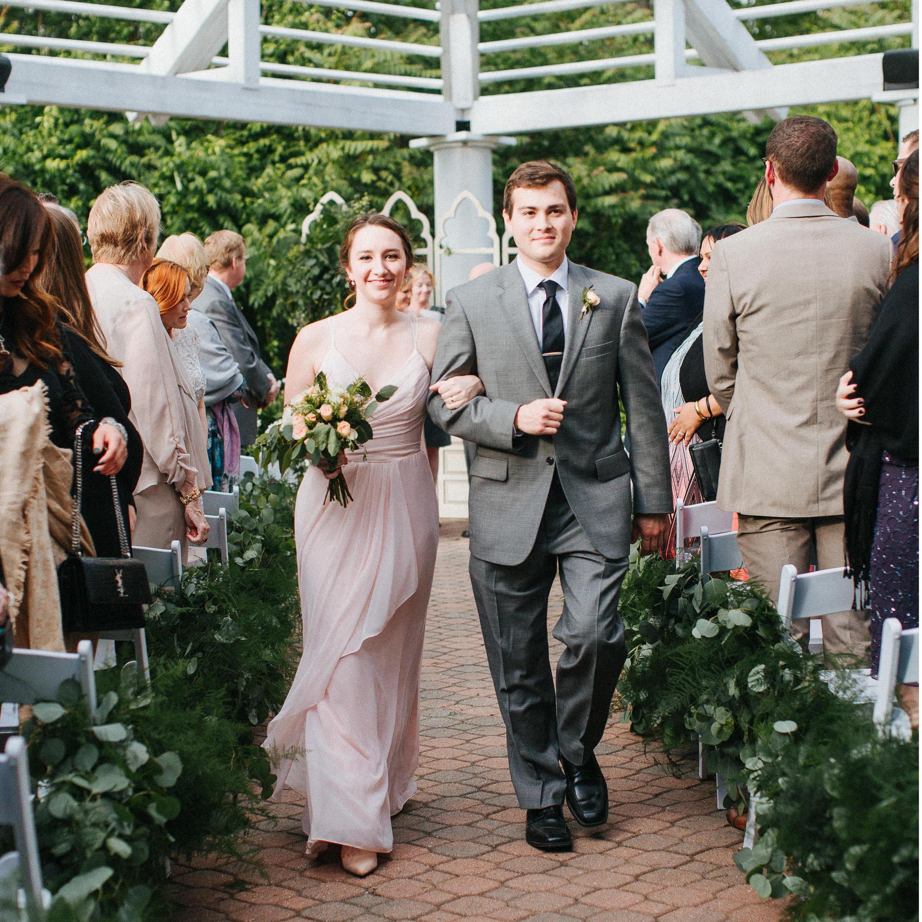 Our first time walking down the aisle together, at Julie Vassar & Colby Pinette's wedding in June 2017!