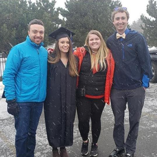 Celebrating Emily's graduation with our best friends!