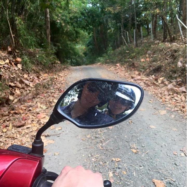 On the back of a two-wheeler headed off to go climbing in Chiang Mai, Thailand.