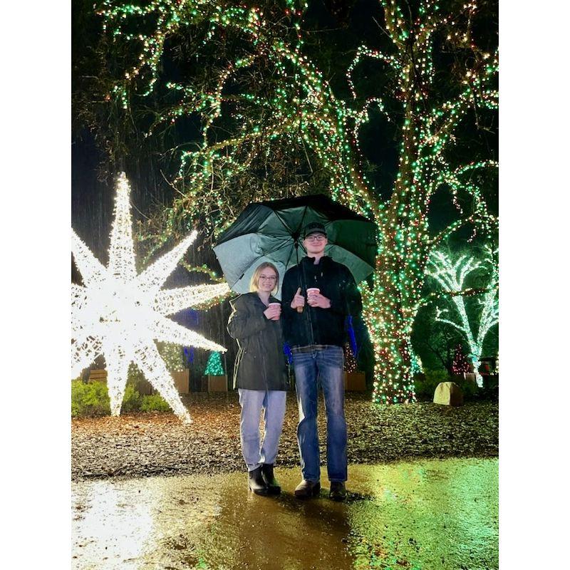 A rainy walk through the Parade of Lights in Redding, CA during the Christmas trip of 2023. I landed in the hospital with kidney stones and was...on some painkillers in this photo.