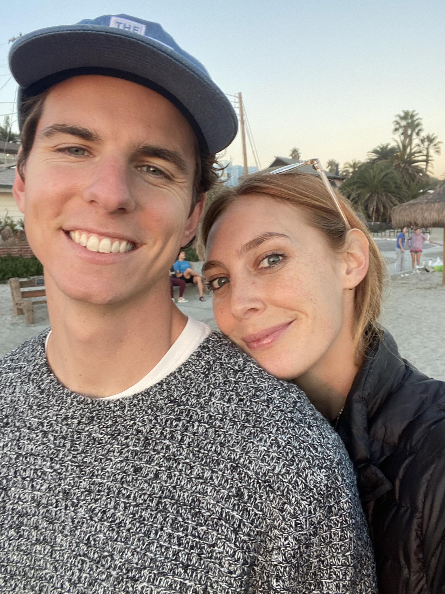 This photo captures Weston and I during one of the most beautiful sunset in our new town that we love and live in called Leucadia.