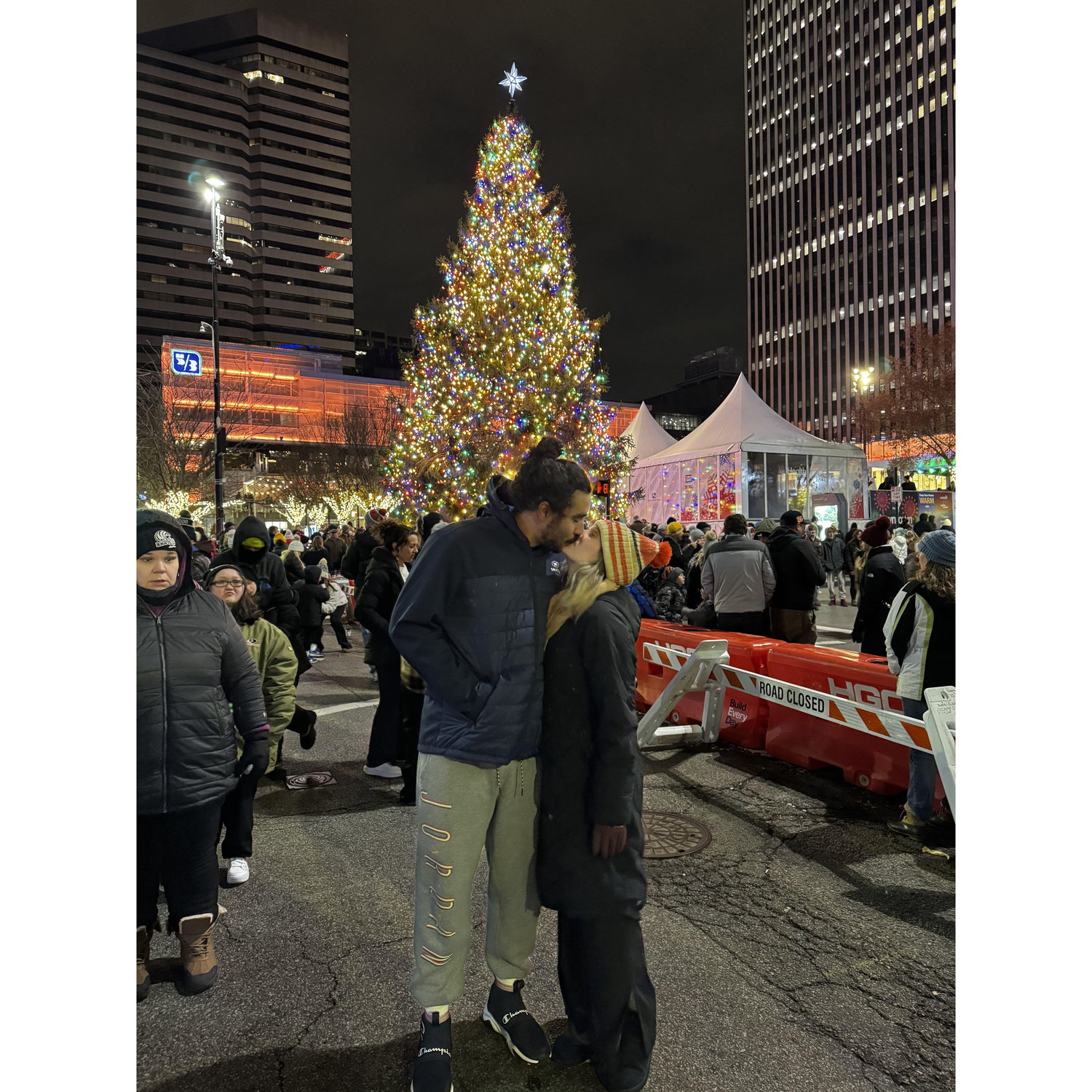 On of our last memories of living in Cincinnati - a kiss under the Christmas tree in Fountain Square!