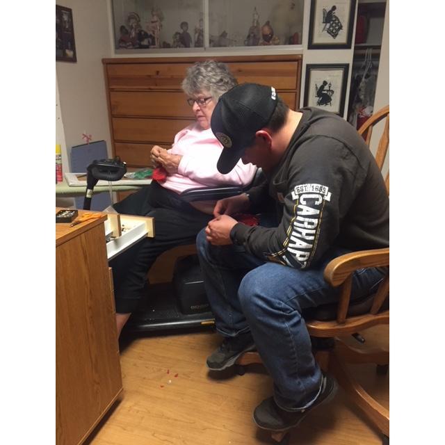 Brooke's Granny teaching Joey how to sew for homemade Mini Ears!