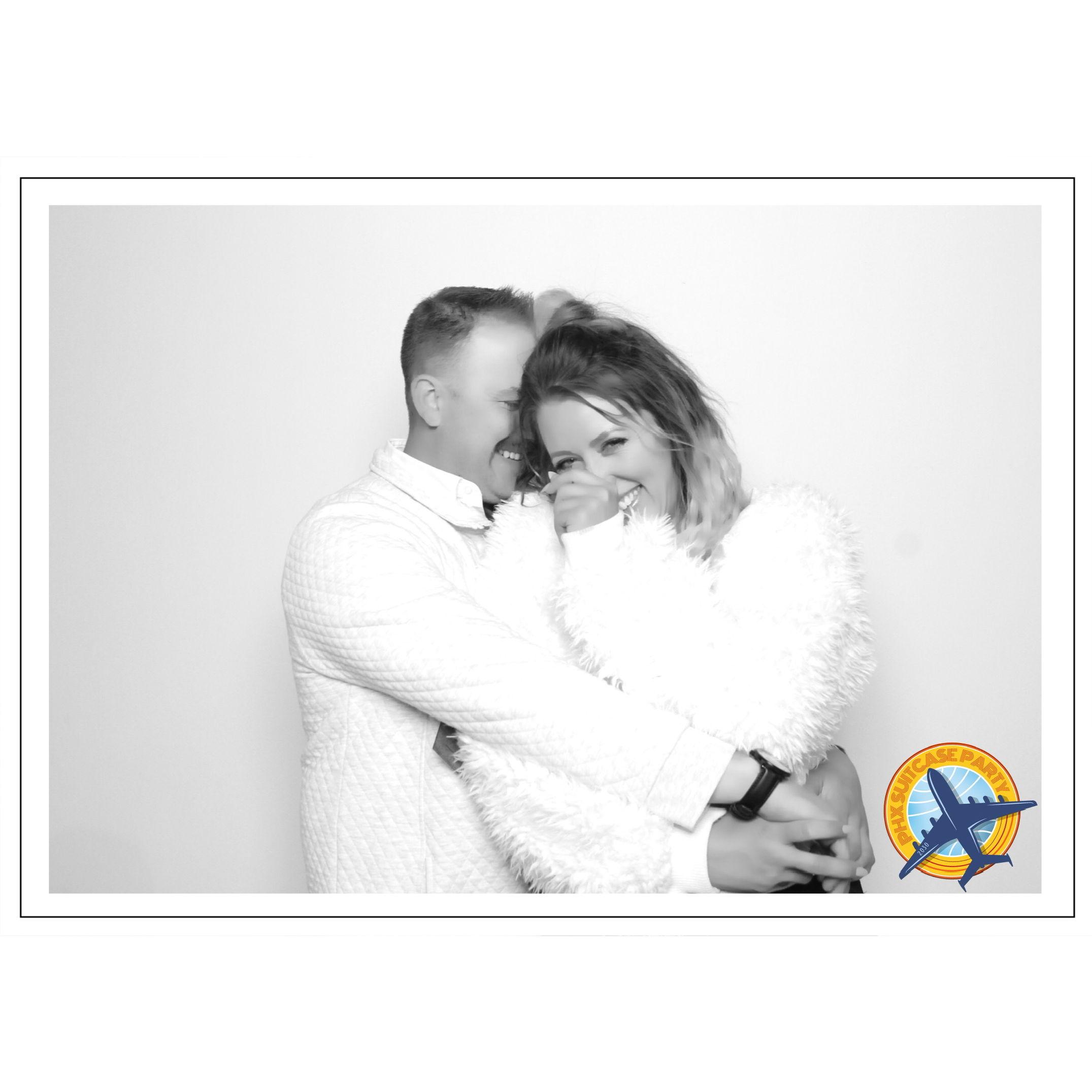 Eric was whispered while laughing "you're a brat" to Kelsey in this photo which brought on more giggles.