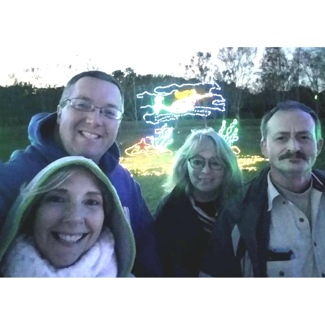 Mermaid Christmas Lights at the Norfolk Botanical Gardens. Love this each year. My kids always want to DRIVE through. Silly brats. Tim & Bonnie know it's ALWAYS better to walk shivering through the whole garden.