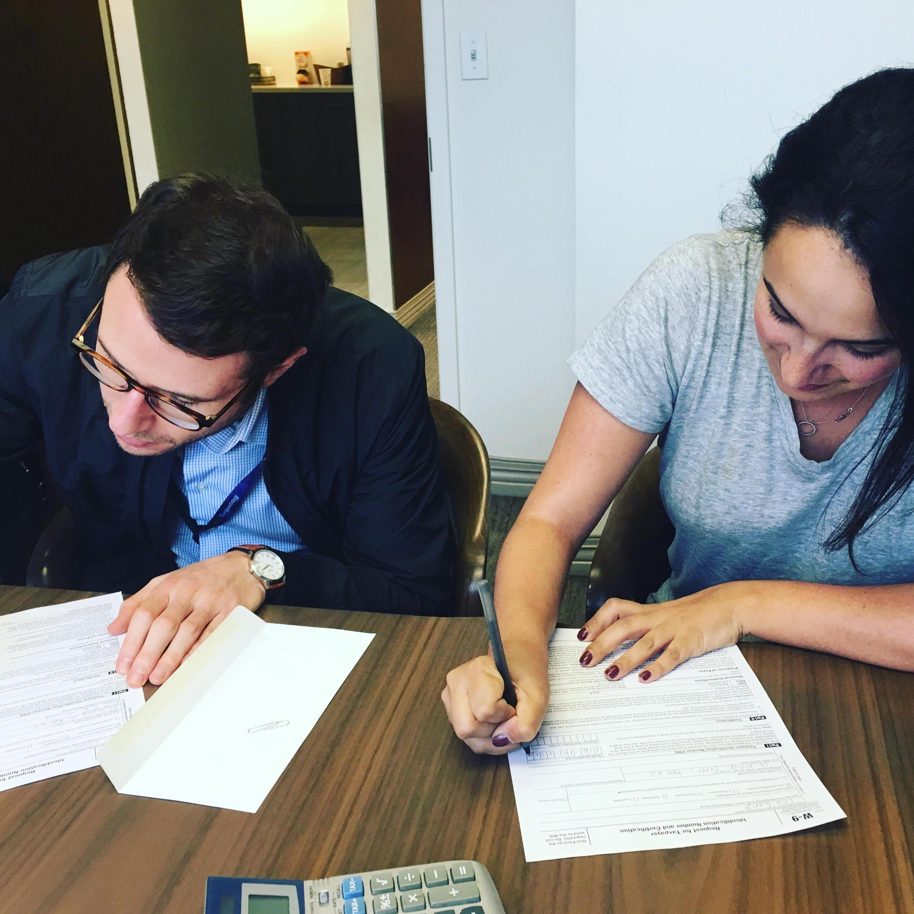 Signing our lease on our first place together!