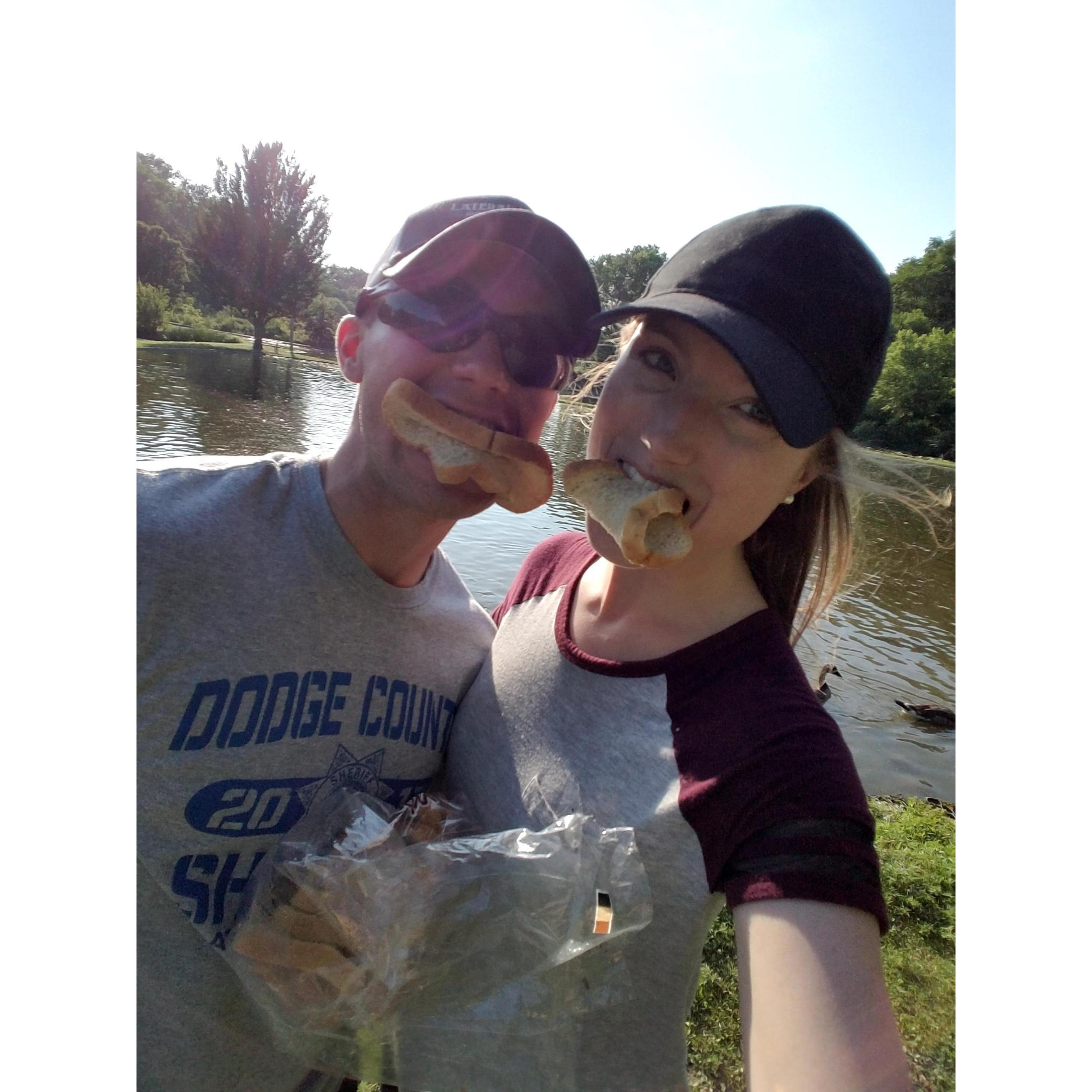 Feeding the fish at Schramm Park. Our only catch for the day? Plenty of smiles and laughter!
