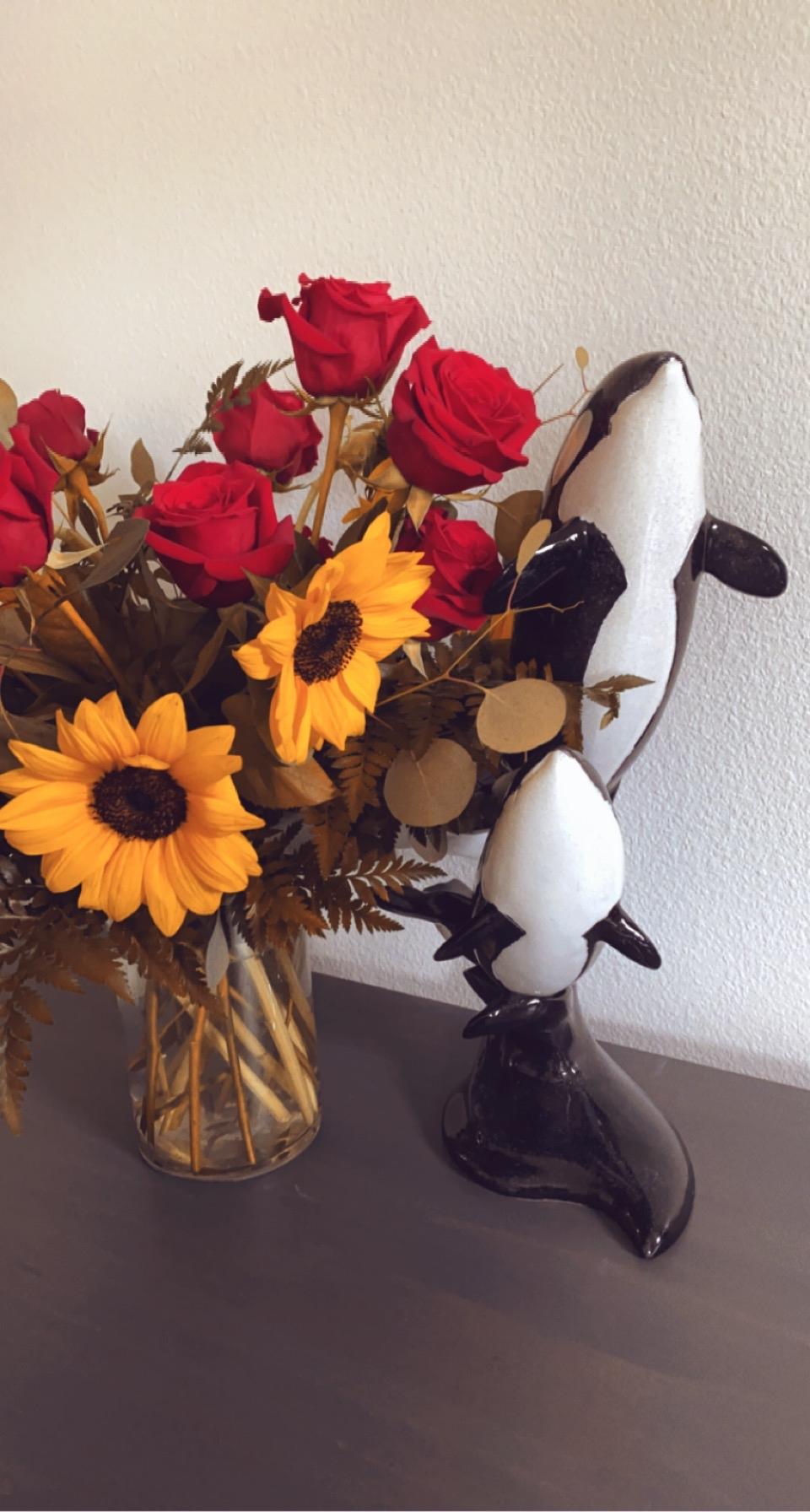 The first flowers I got from Justin. Roses because we found a rose garden in LA and sunflowers because they are my favorite