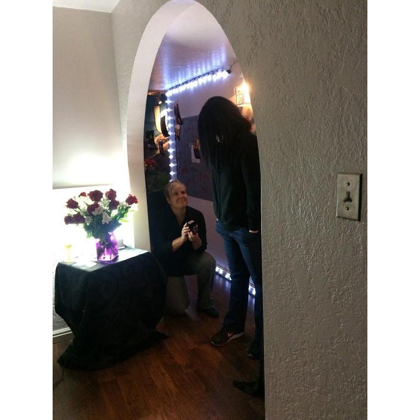 On one knee, popping "the question". September 2017.