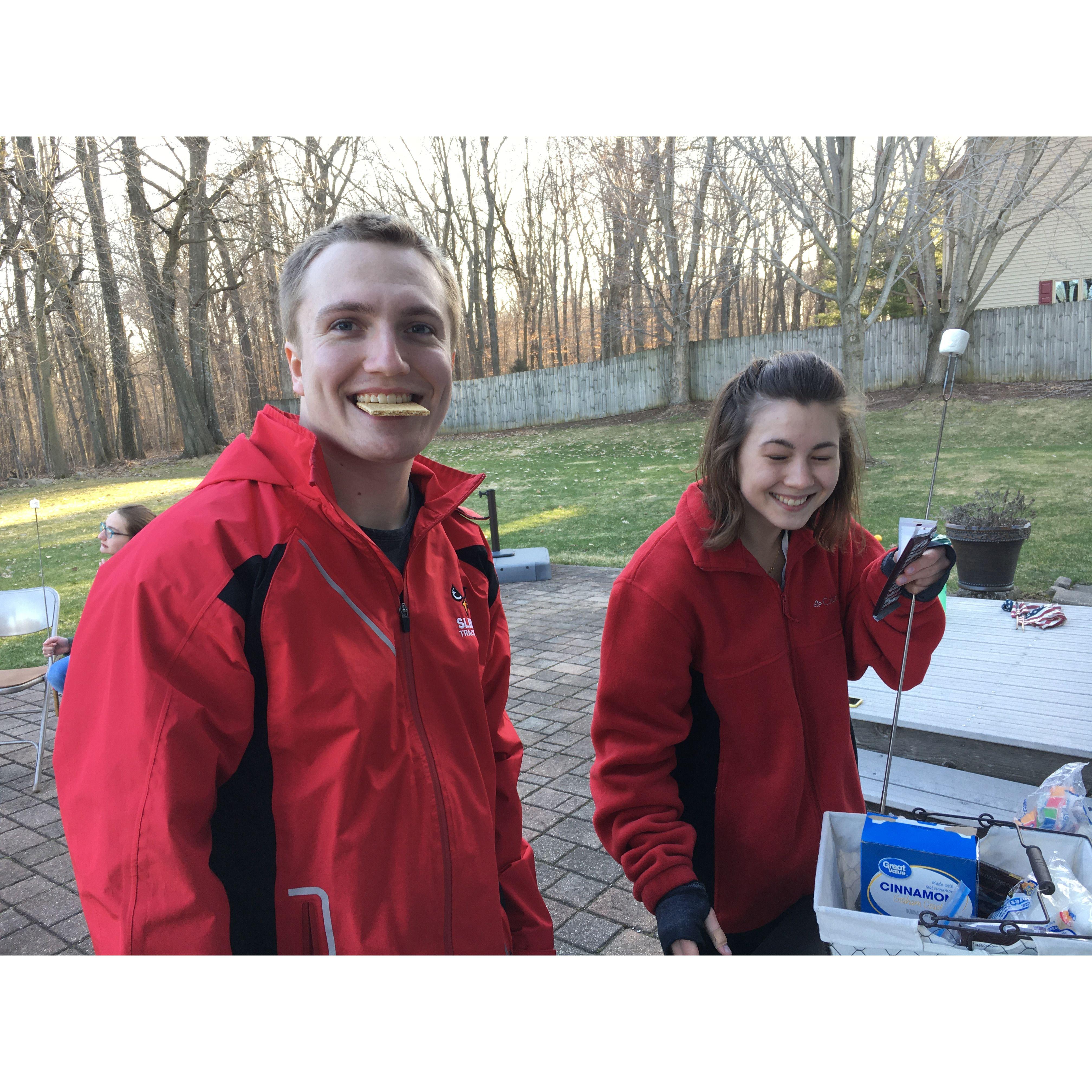 Toasting marshmallows in the backyard during the pandemic