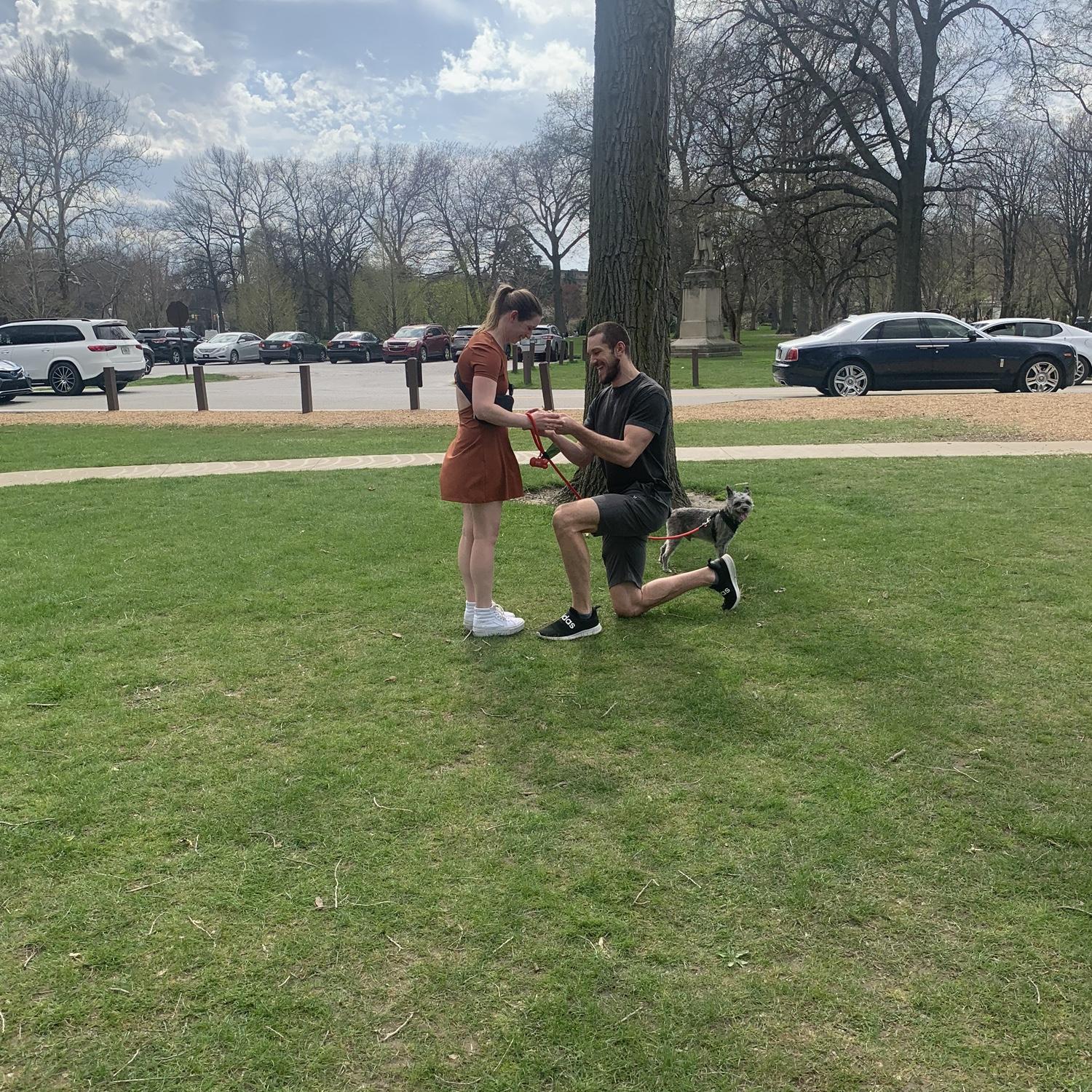 The proposal! Captured by strangers in Edgewater Park (where we had our first date)