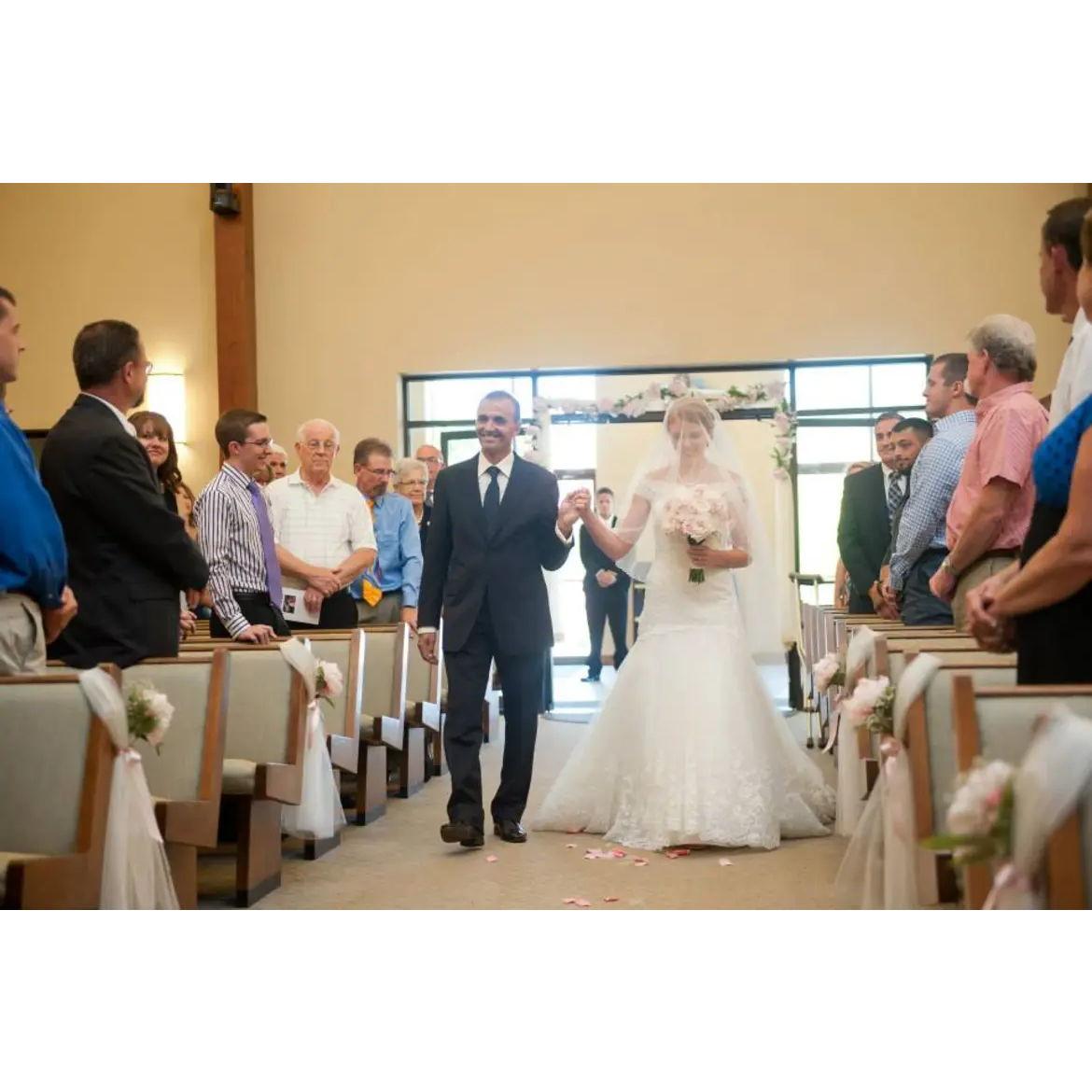 Wedding ceremony in Evansville, IN at Resurrection Church