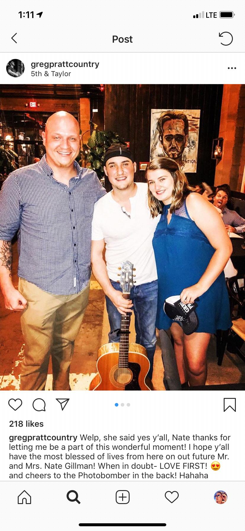 This shot was taken at dinner after Nate proposed to Kayla. Nate had hired Greg Pratt, the musician in the photo, to sing one of our favorite songs at dinner.