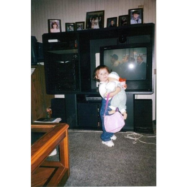 Gabby as little girl :) Featuring big baby who she carried everywhere for a long time.