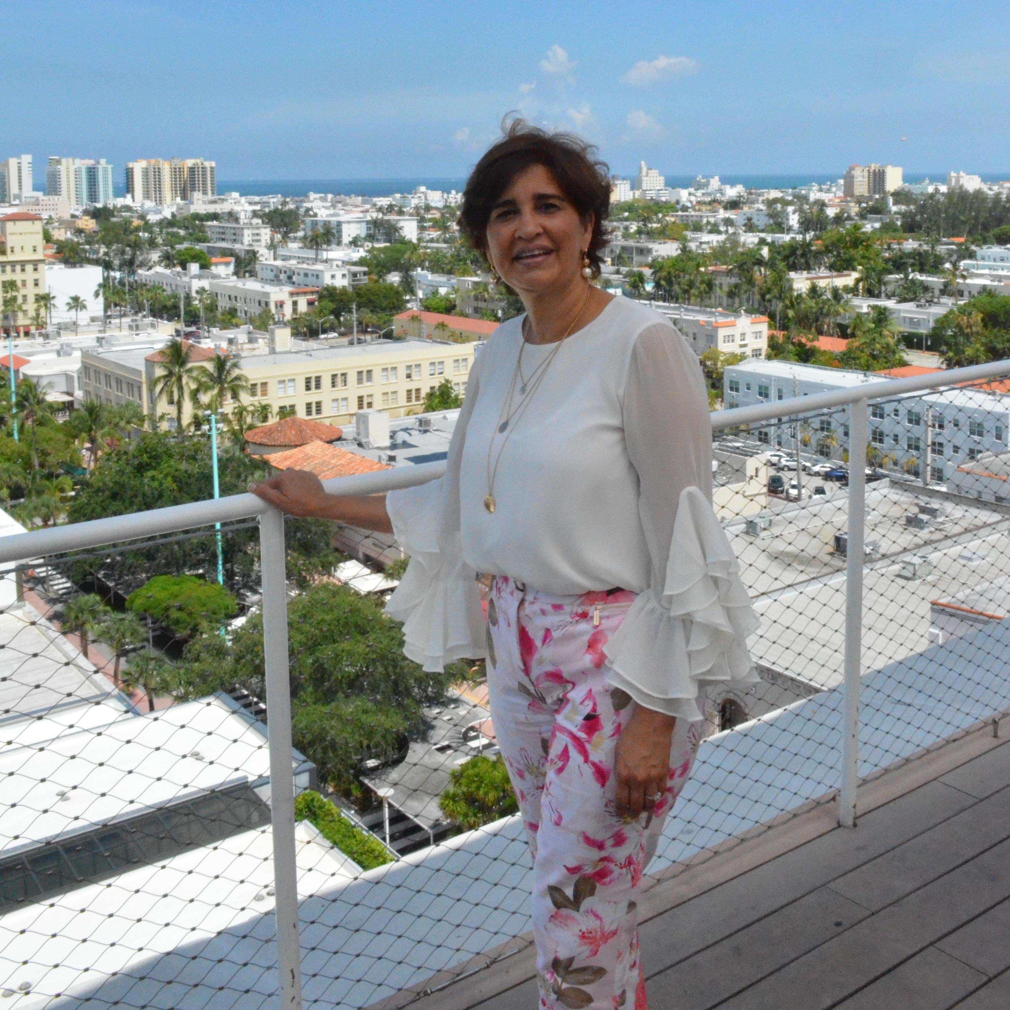 Amanda's mother Evelin striking a pose on the rooftop! Doesn't she look beautiful!