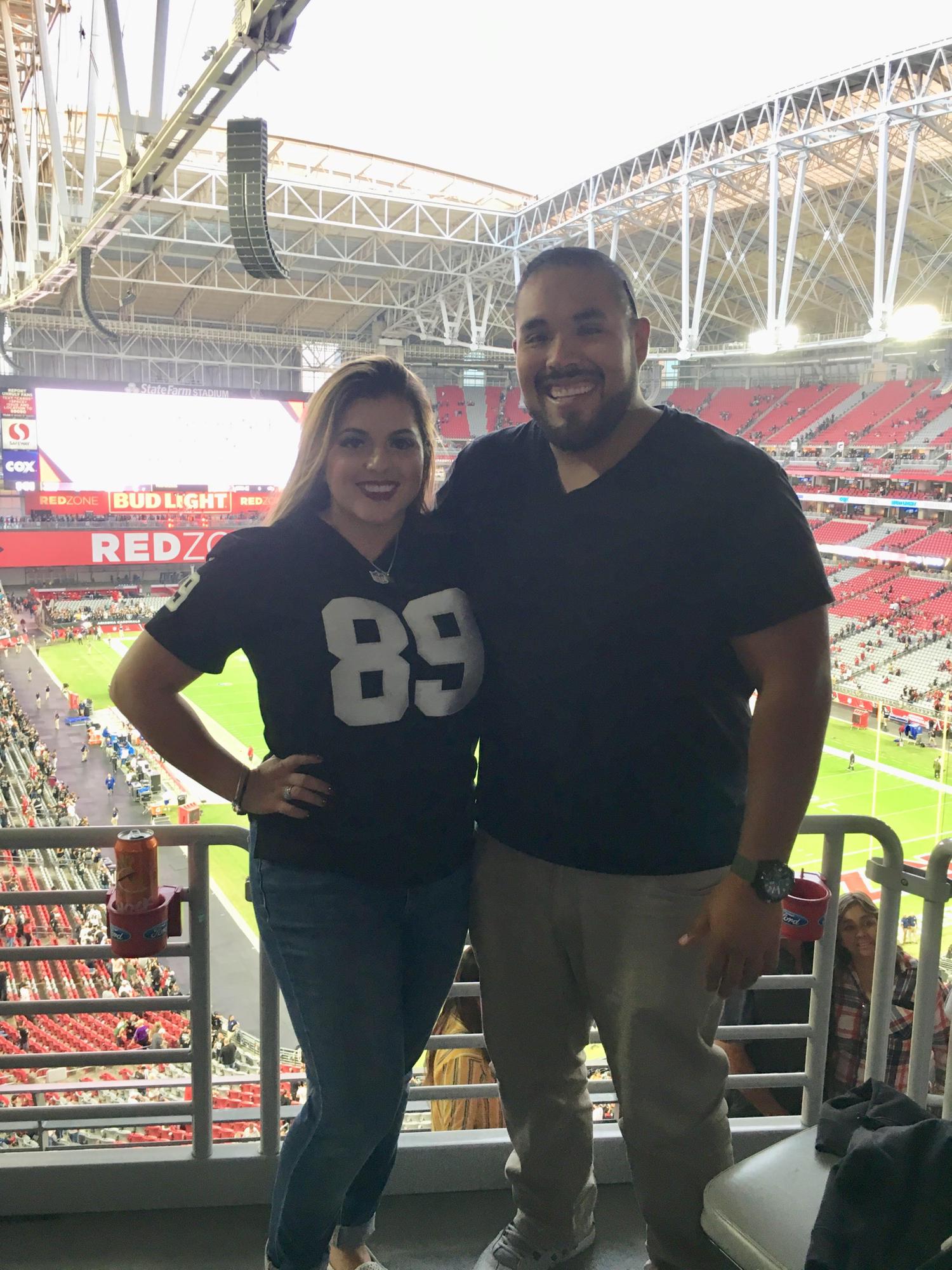 Watching the Raiders (Raul secretly loves black & silver)
