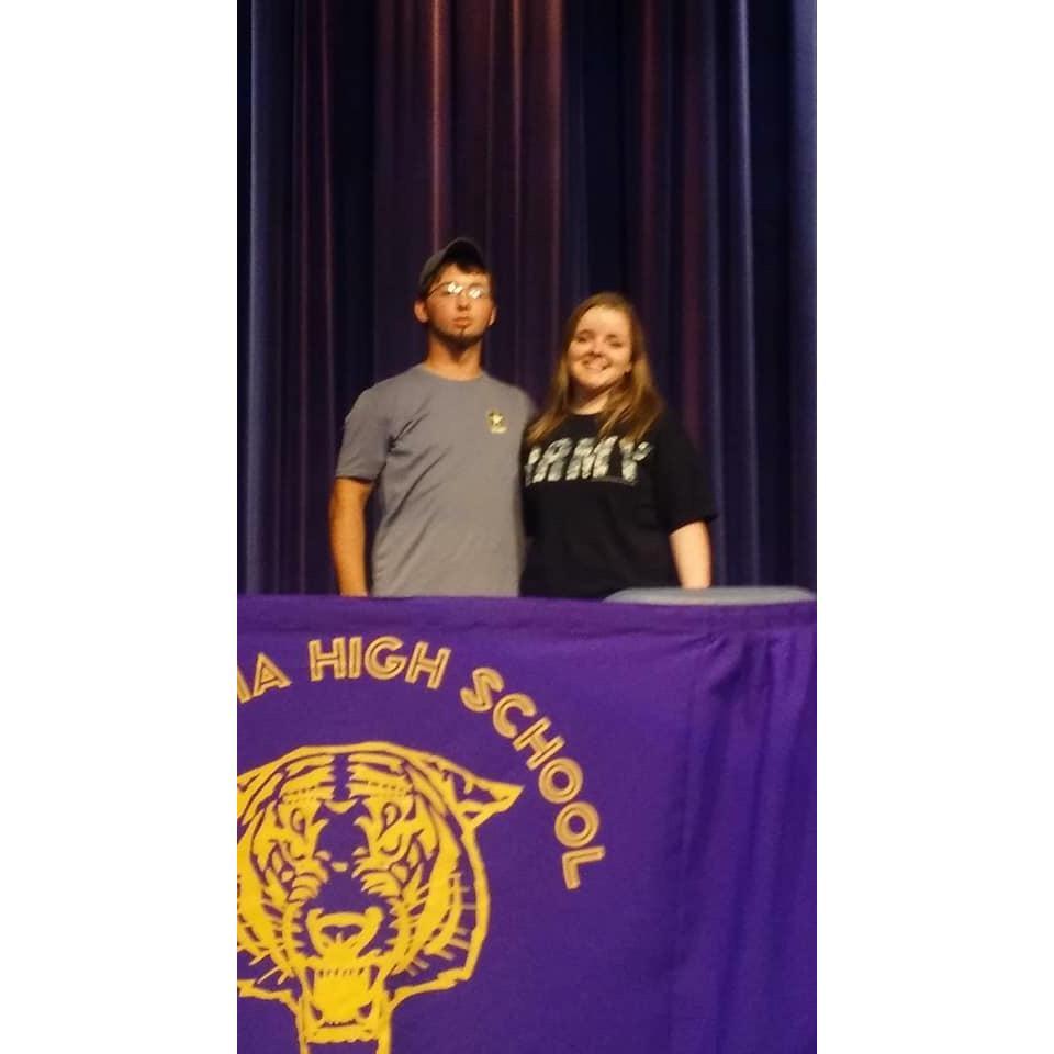 Little blurry, but DJ's signing to the military