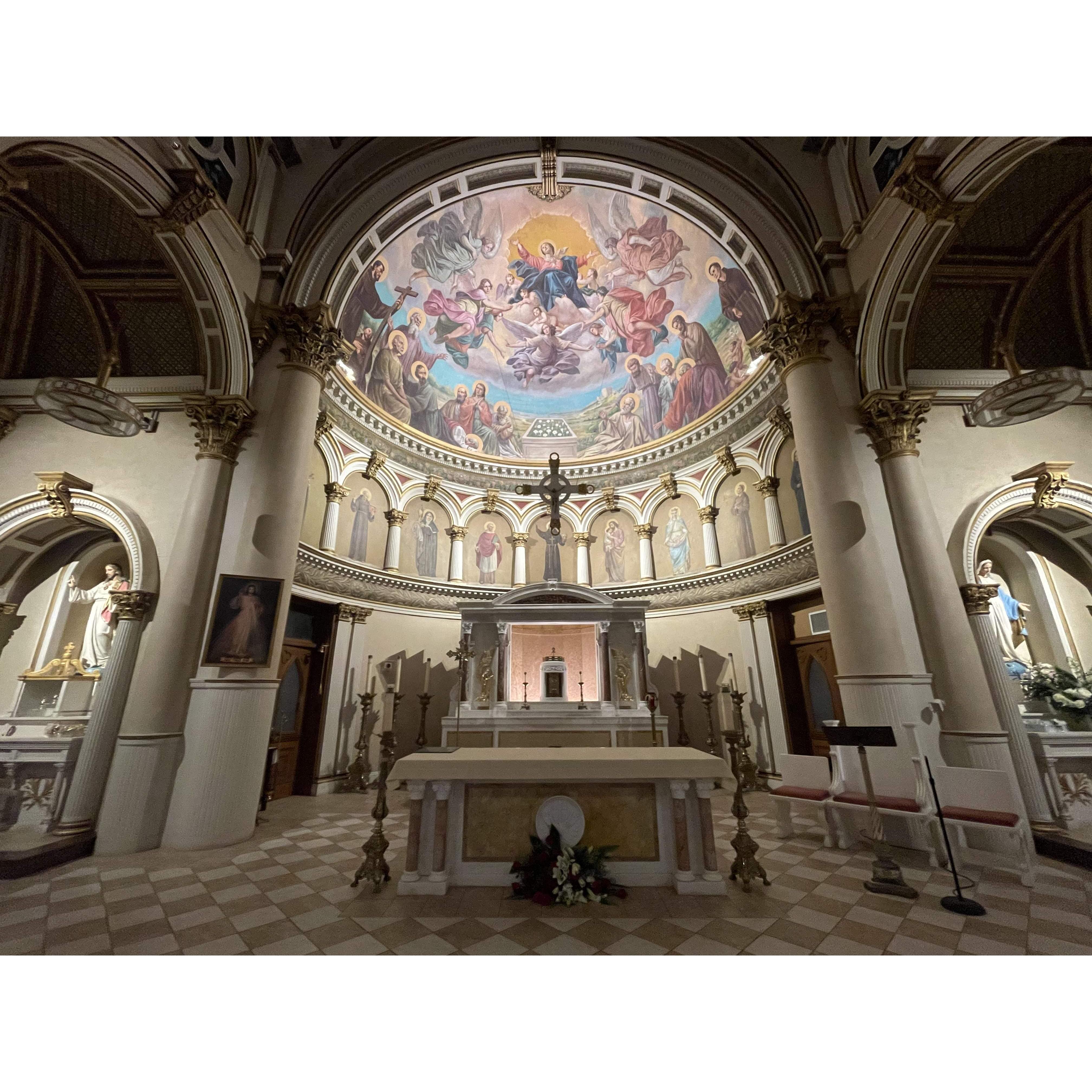 Jakub proposed to Catherine right in front of Jesus in the tabernacle at St. Leonard's Catholic Church in the North End, Boston.