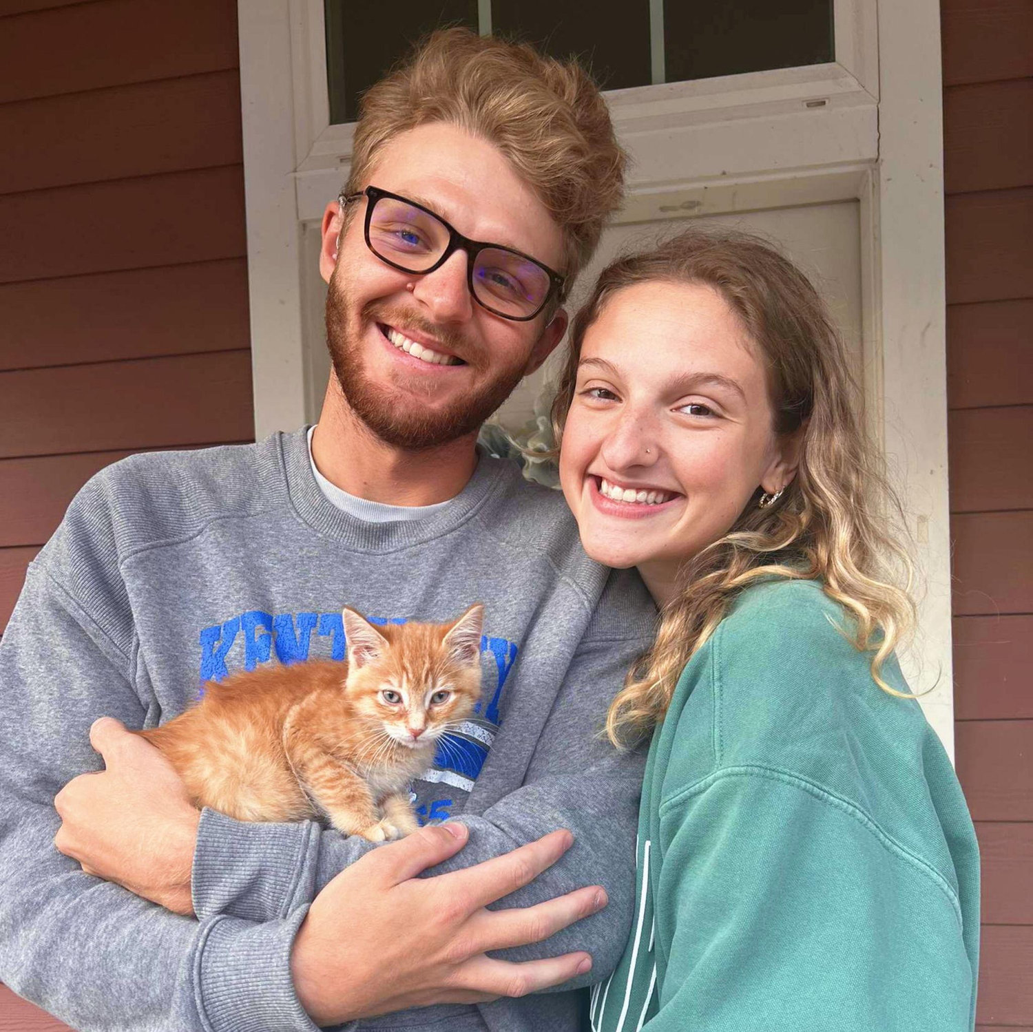 This was taken in August of 2022 when Kaleb and Madelyn adopted their first cat, Alfie James!