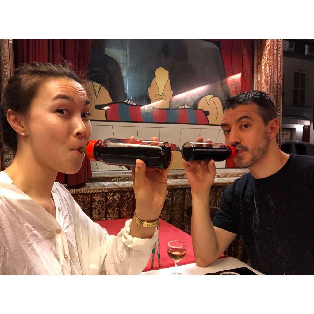 A wine bar in Paris - they served us wine out of baby bottles!
