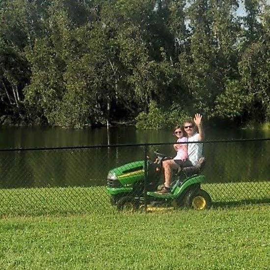 Mowing our lawn with the best helper!