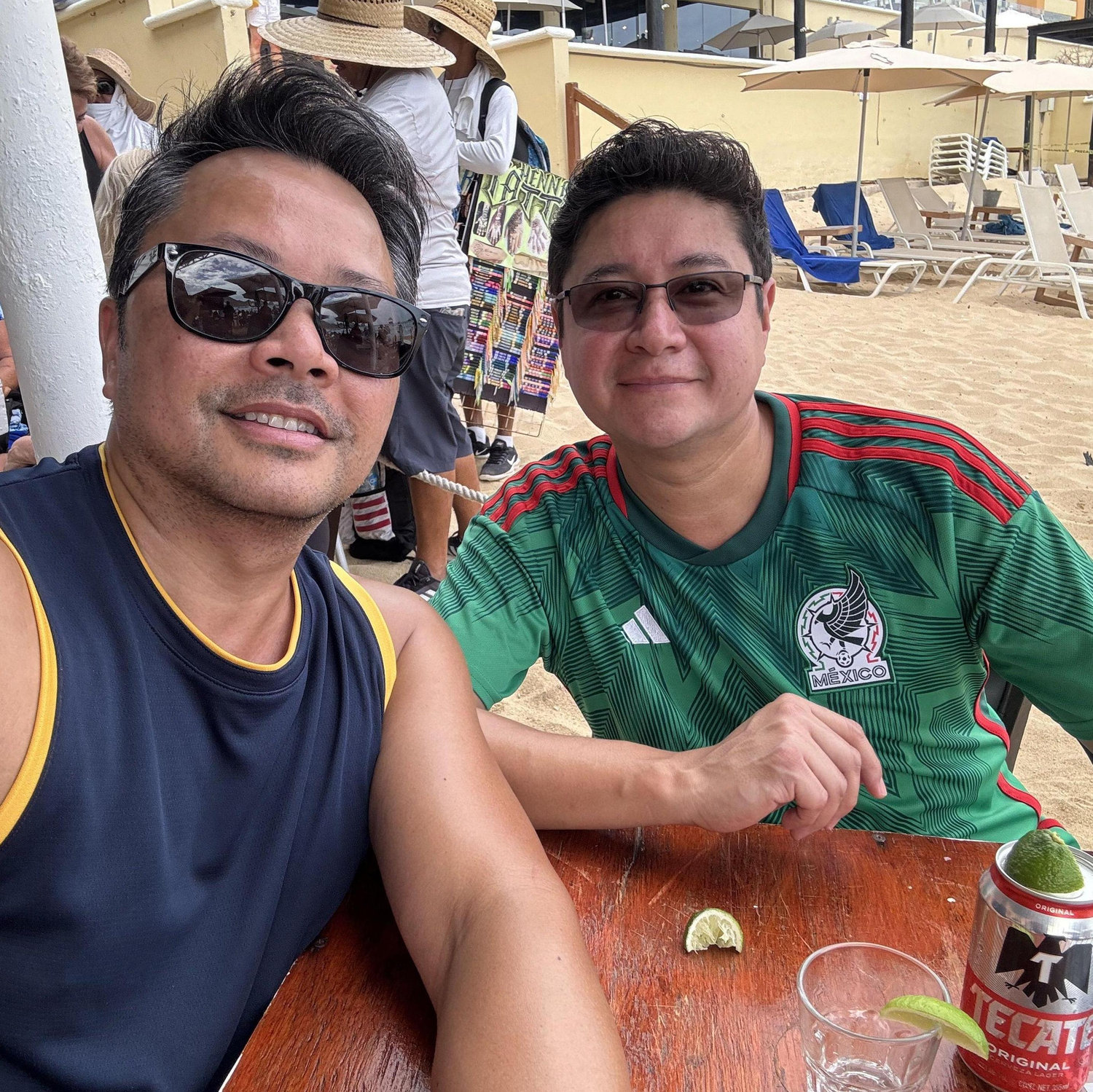 Enjoying a drink on the beach after an al-fresco massage during a cruise layover in Cabo