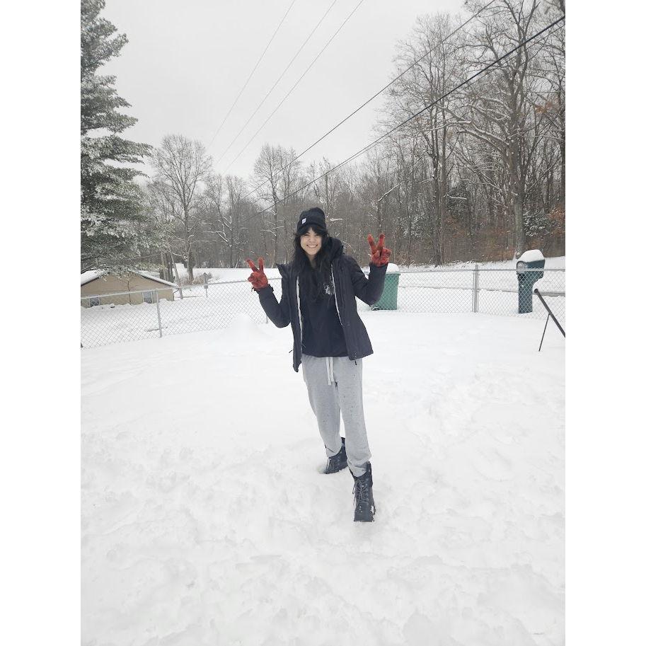 Sabrina first time seeing snow fall at our place, Katie thought she was adorble.