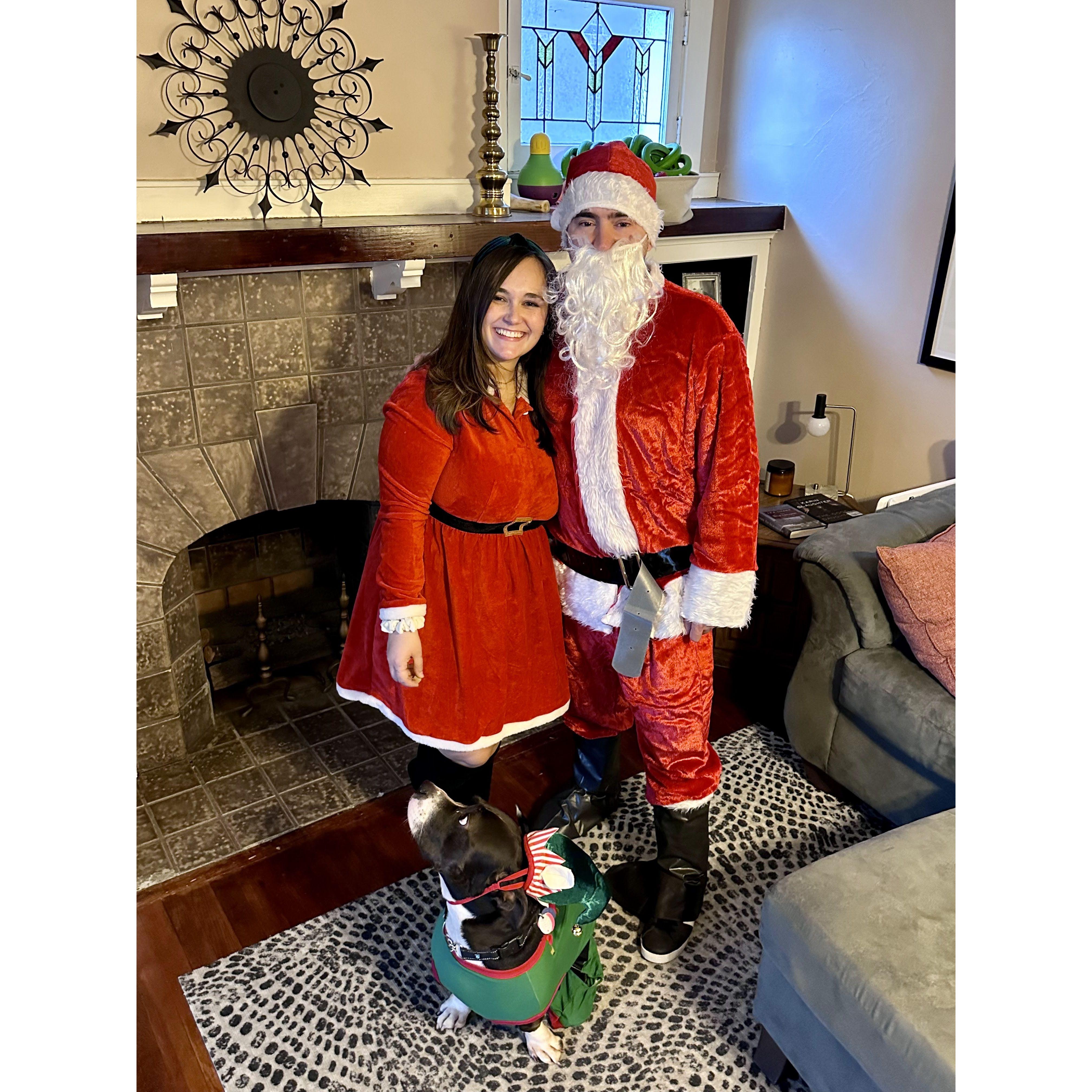 celebrating Halloween as Mr & Mrs Claus with one little elf