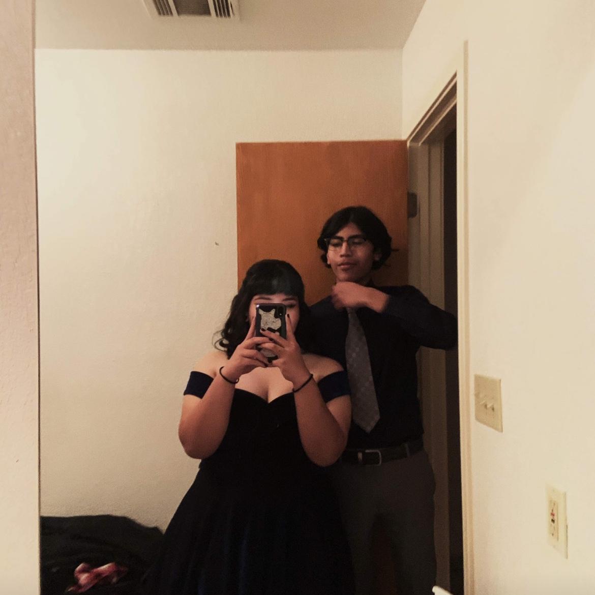 This was right before our Homecoming dance Sophomore year. I was so excited, but I was dreading wearing a dress, but he made me feel so pretty. -Cori