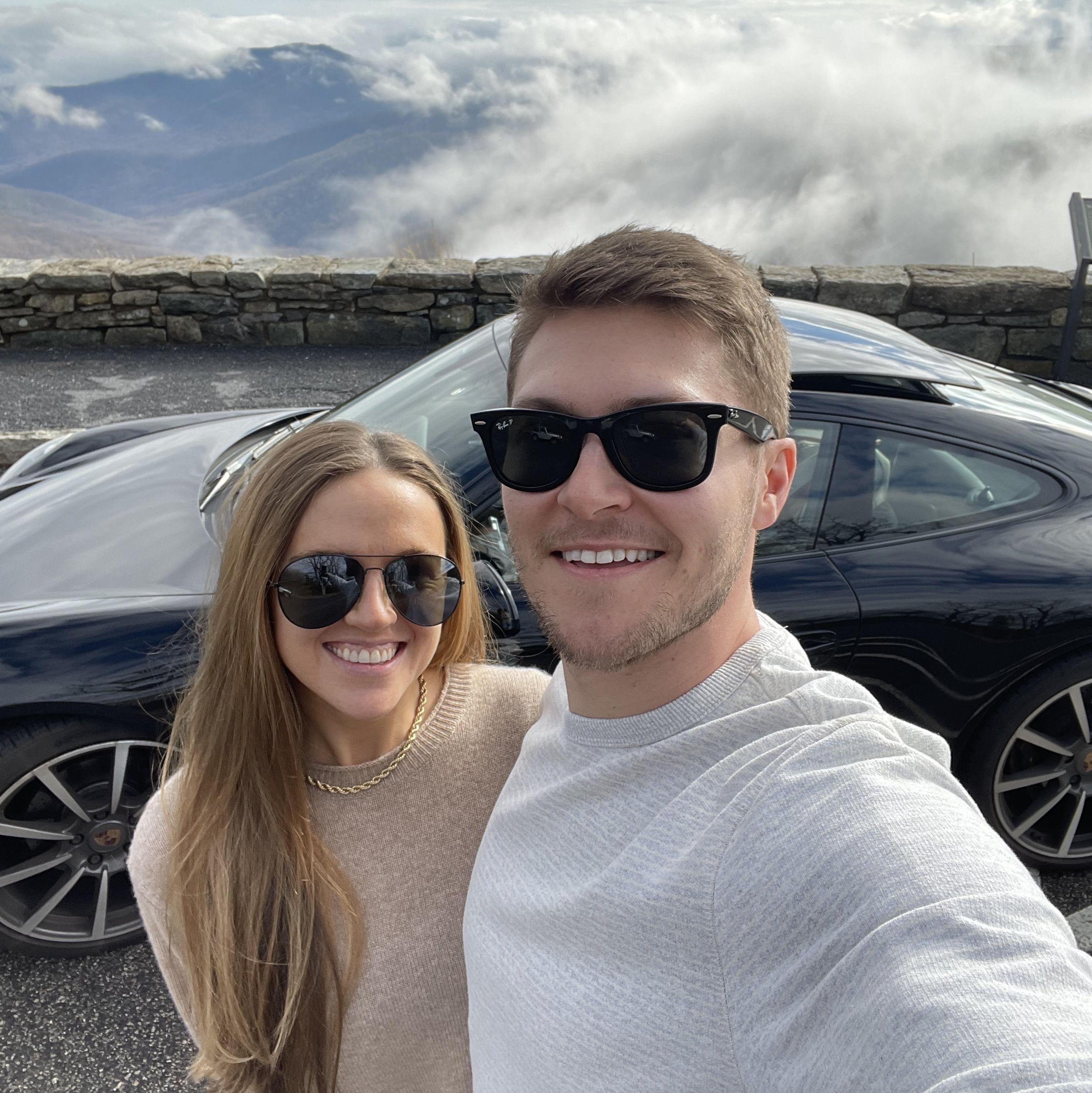 Mike's two favorite things - Katie, & fast cars