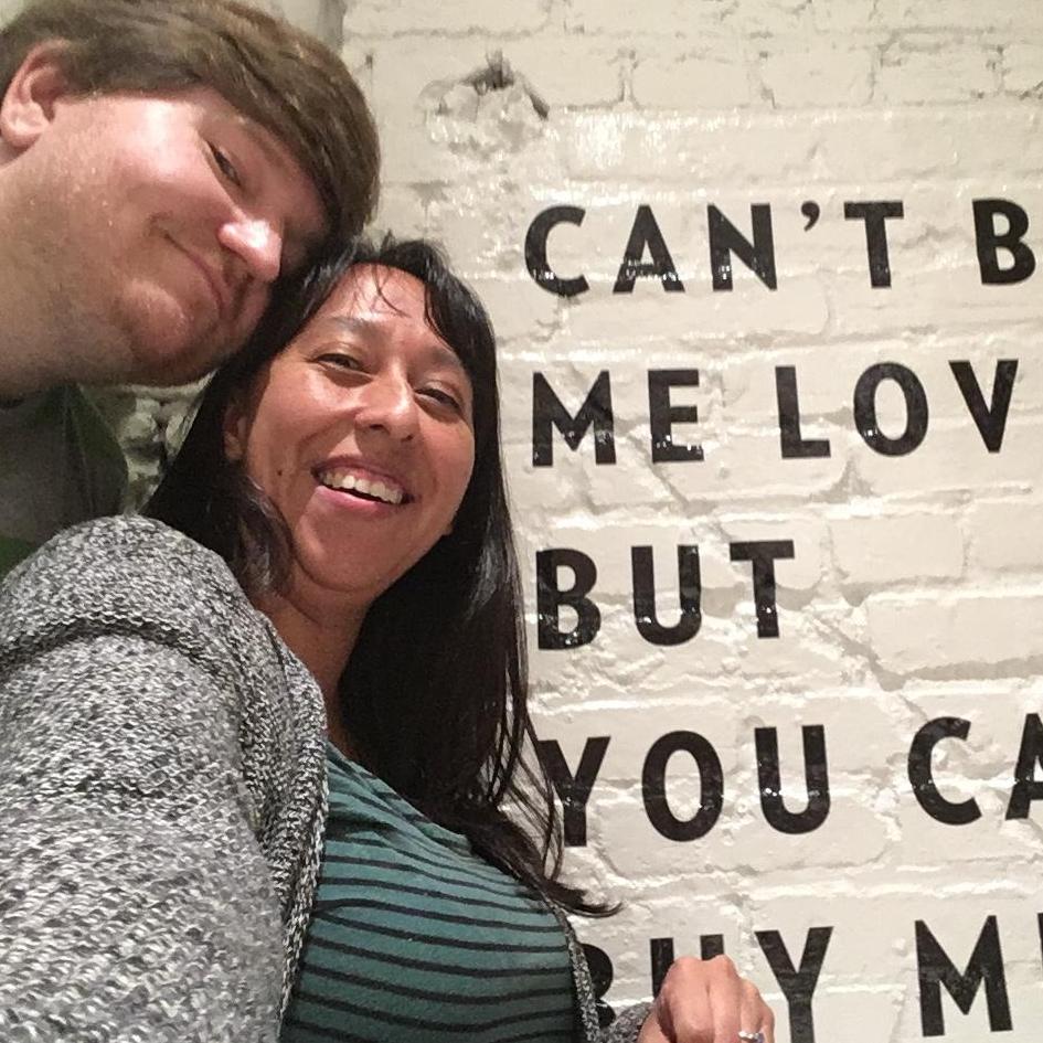This actually says "You can't buy me love, but you can buy me ice cream"