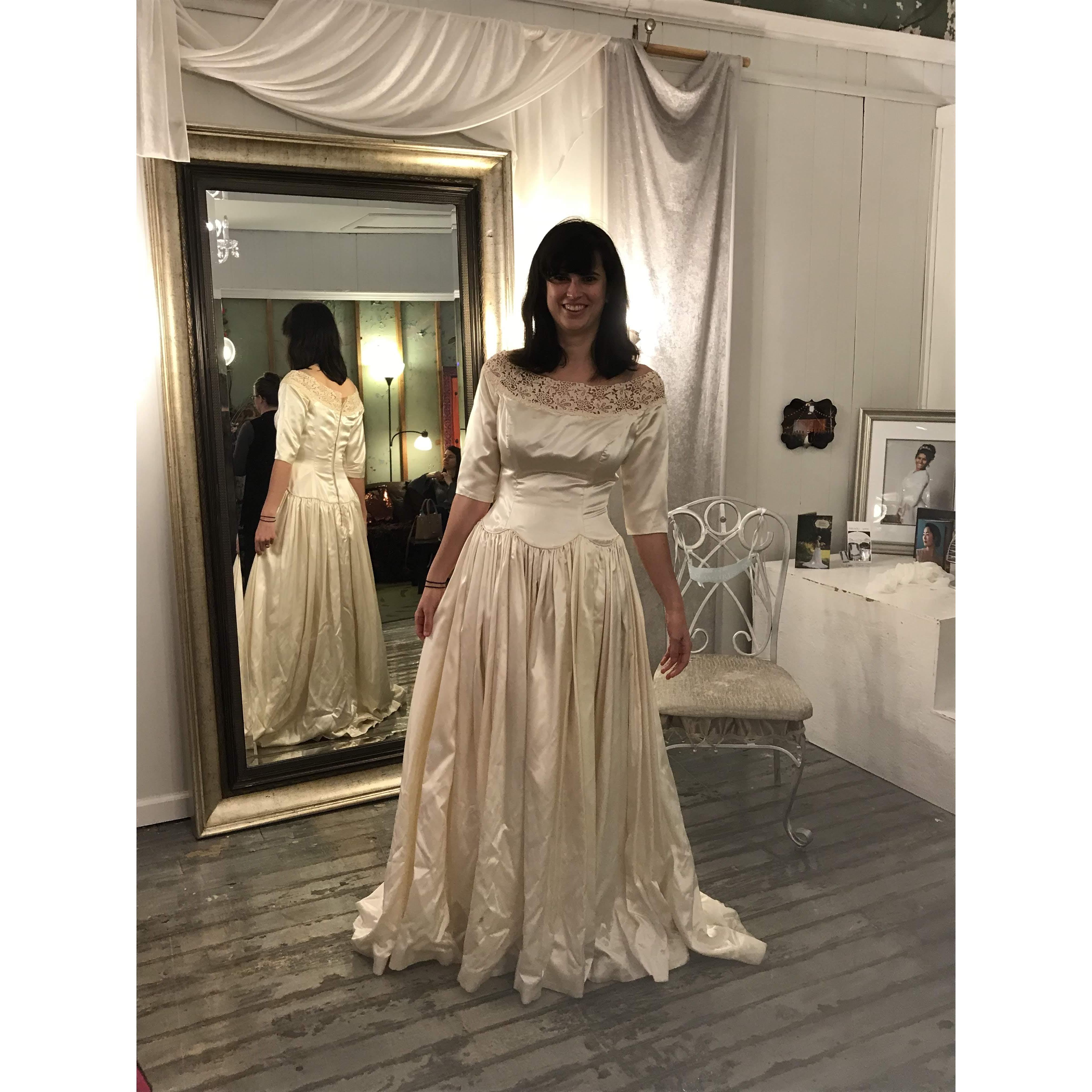 Miranda Hogan trying on Beverly's dress.