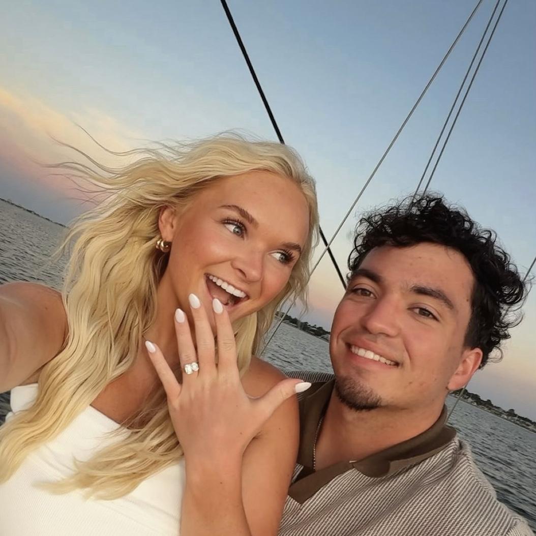 Our Proposal Story:
During our annual family beach trip to Orange beach, Colten surprised Alexis with a private sailboat ride as the sun was setting over the water. While she was looking over the boat, she turned around to find him on one knee. In the excitement of the moment, he completely forgot to ask the question — something they still laugh about — but it was the perfect, unforgettable evening and the easiest “yes” of her life.