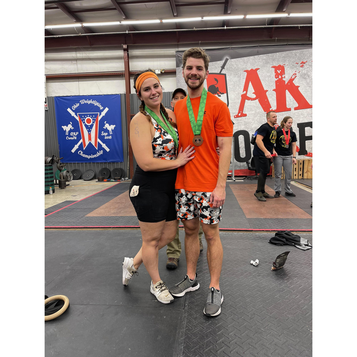 We spend a lot of nights crossfitting together, and brought home third in our first partner competition !