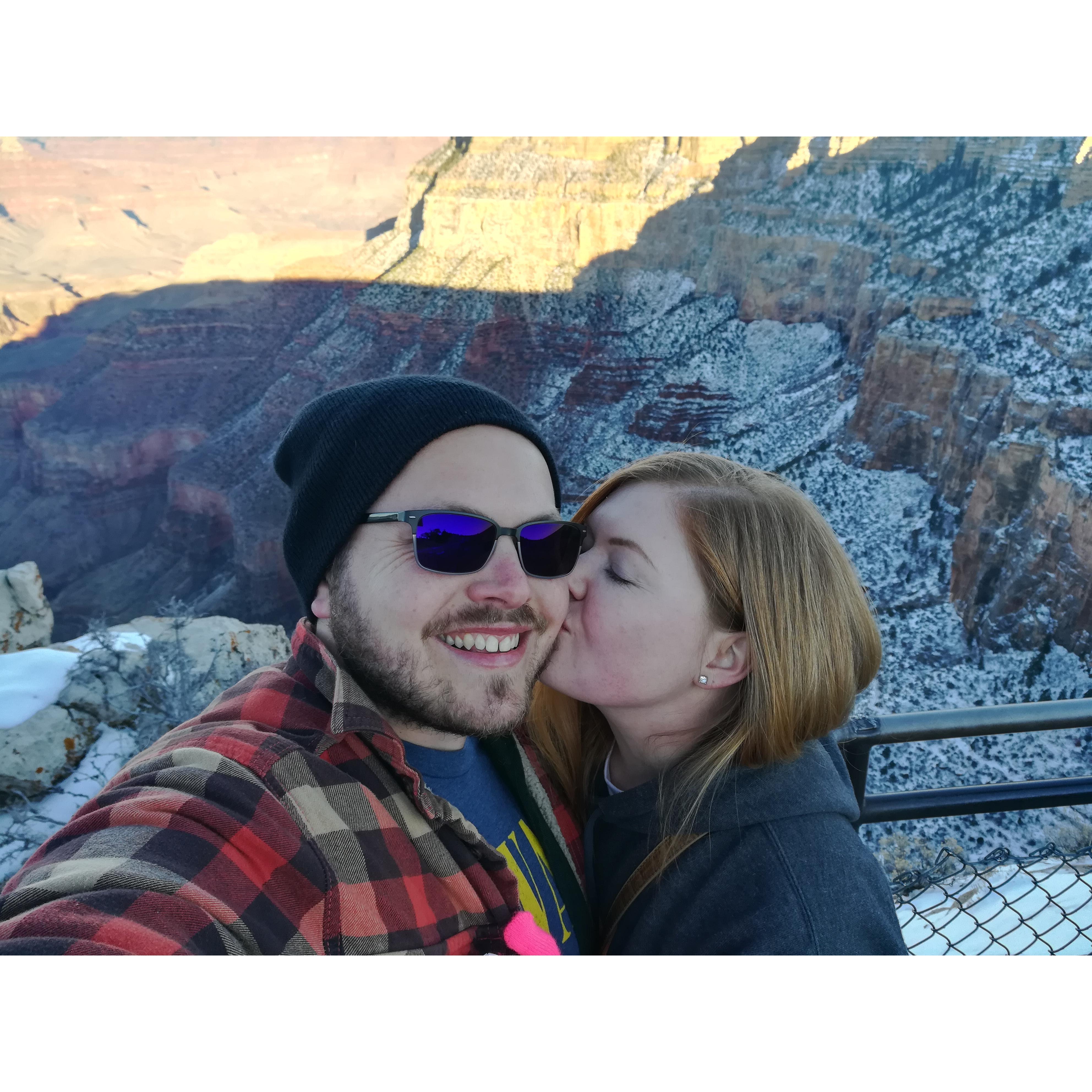 Visiting the Grand Canyon on our one-year anniversary trip. We just got engaged the day before.
