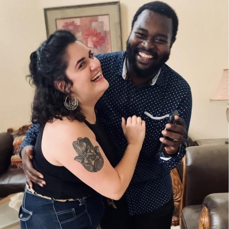 The proposal was a total surprise! Robertson proposed at the home of his mother and sister, with family (both in person and online!) watching with joy.