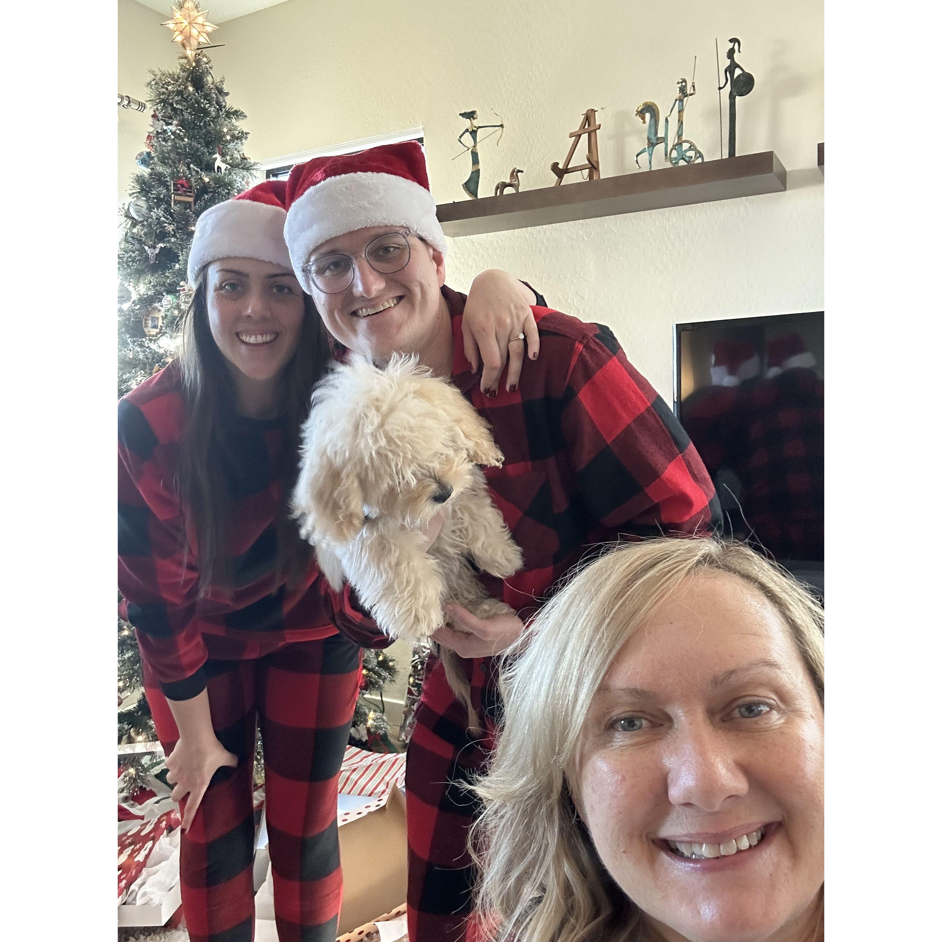 All of us on Christmas with the mother of the groom, Debbie and our new puppy, Teddy.