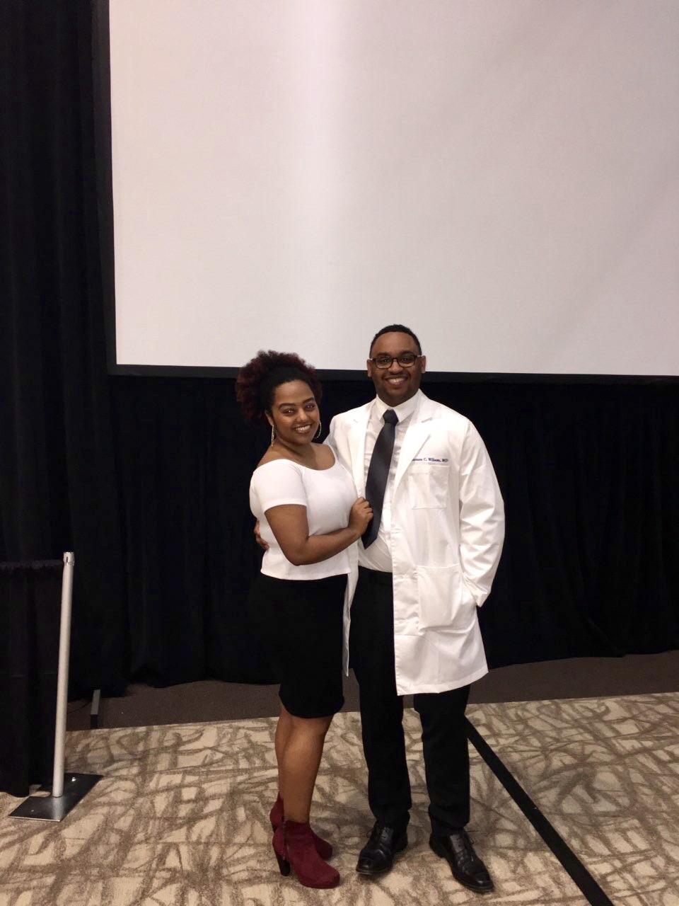 Beakal and James when he received his long white coat