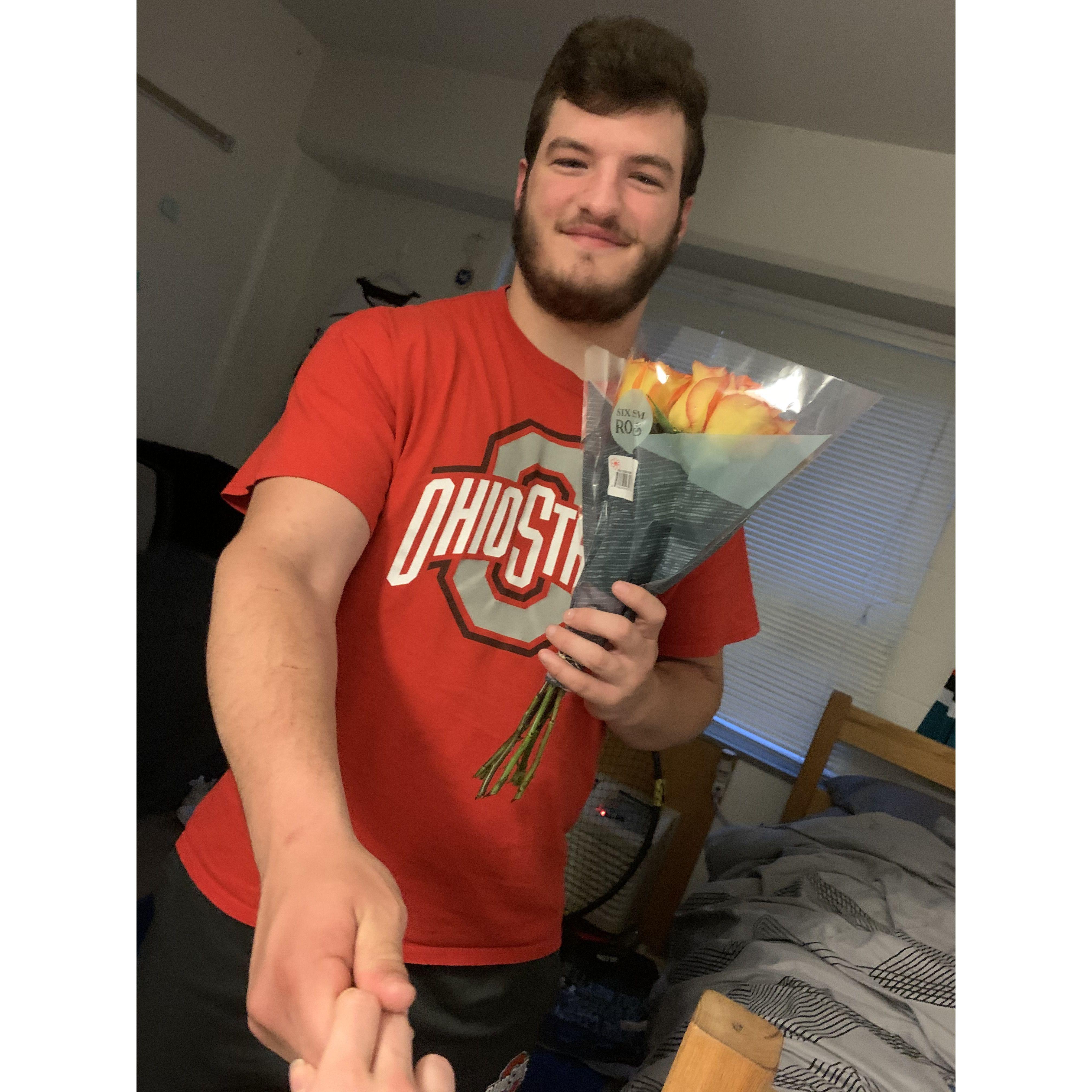 After two months of dating, Cody's friends all made fun of him for not officially making me his girlfriend. He showed up to my dorm the next day and made it official with flowers :)