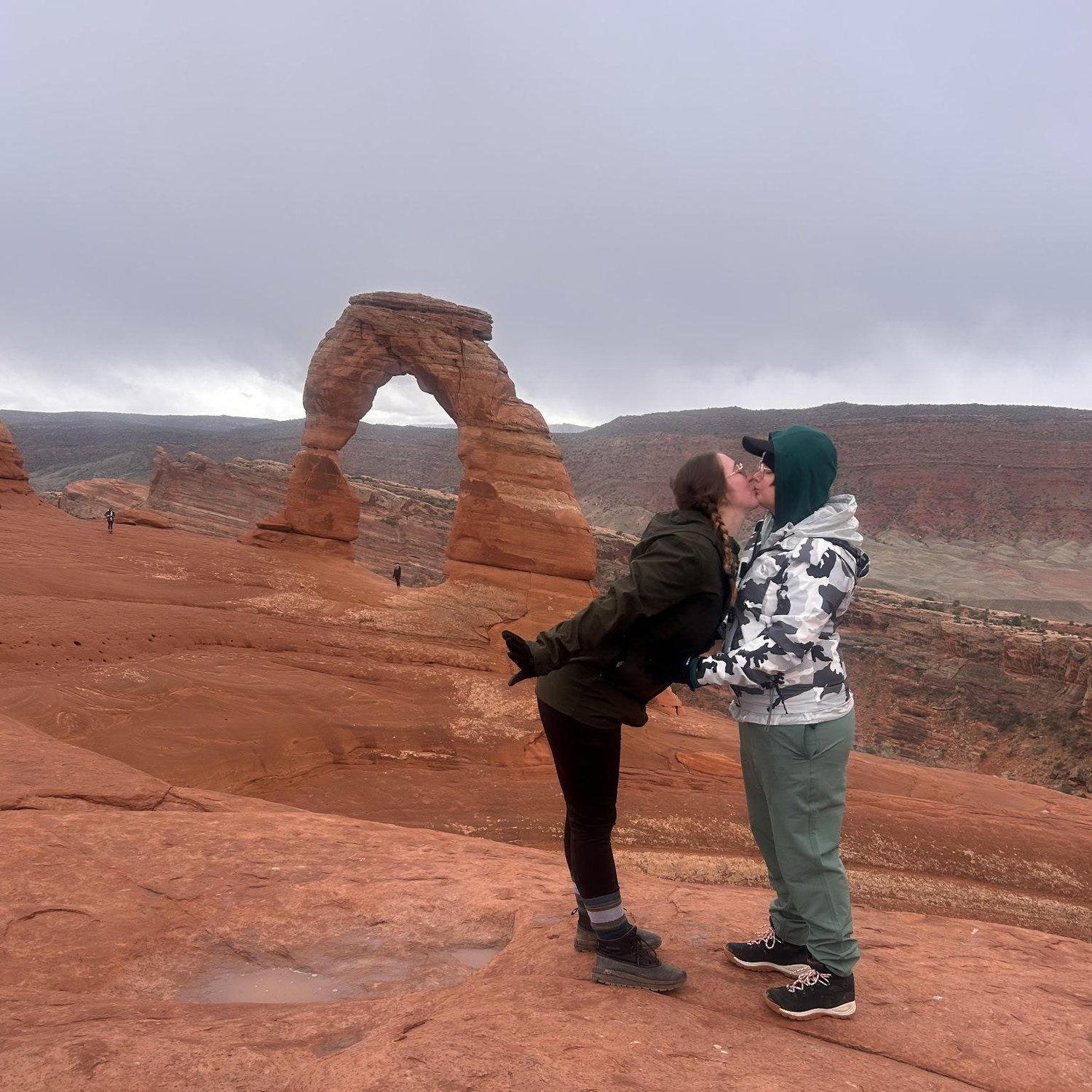 Kim proposed back to Katy under delicate arch (despite her being grumpy, she said yes)