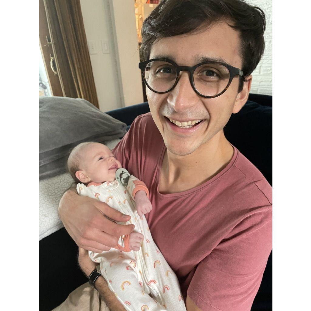 Tío meeting his niece, Ruby, for the first time