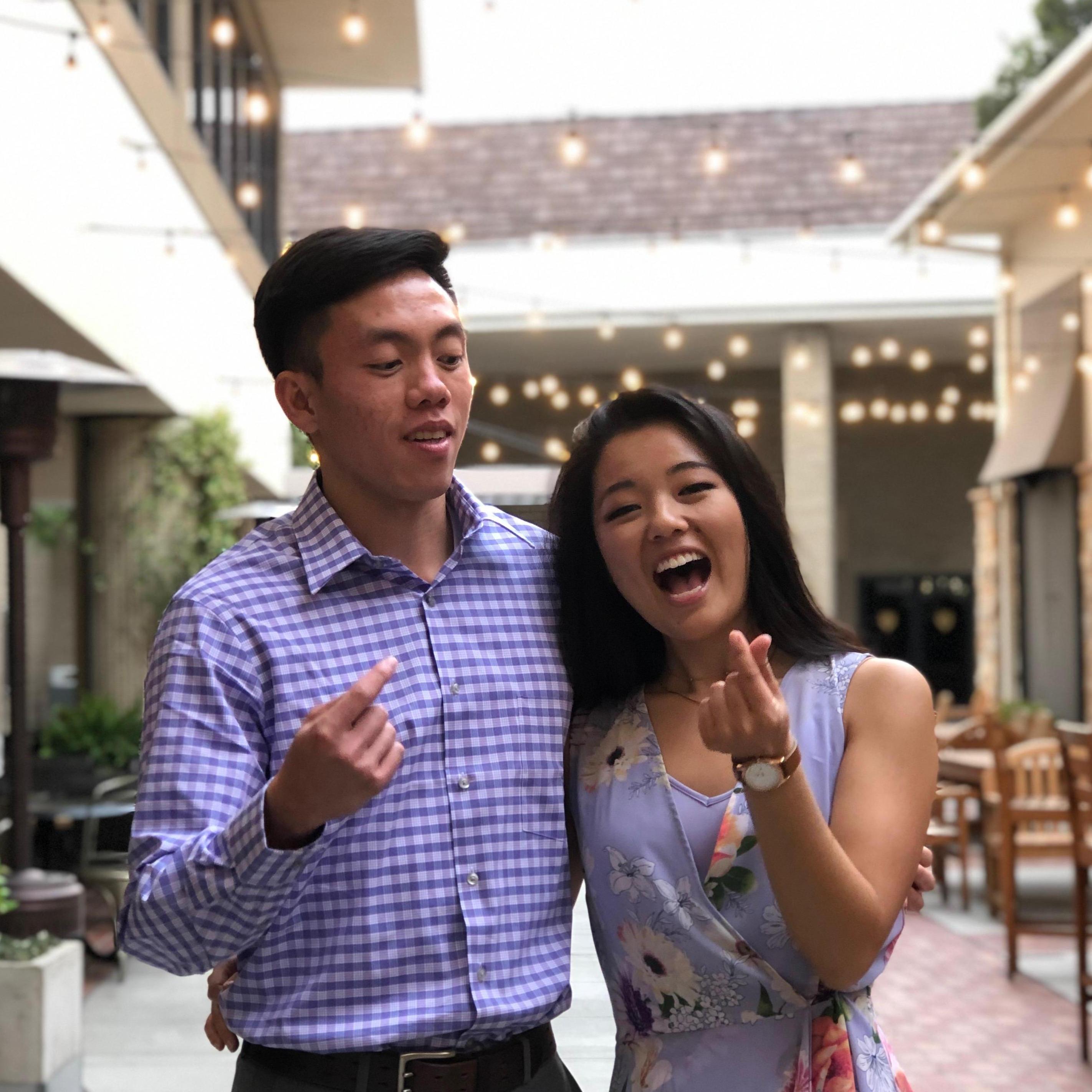 Grace is teaching Isaiah how to do the Korean finger heart! Here he is, learning her ways.