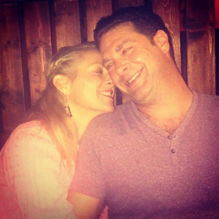 DJ snapped this one while stealing my phone. Going out for Mexican always makes us smile :)