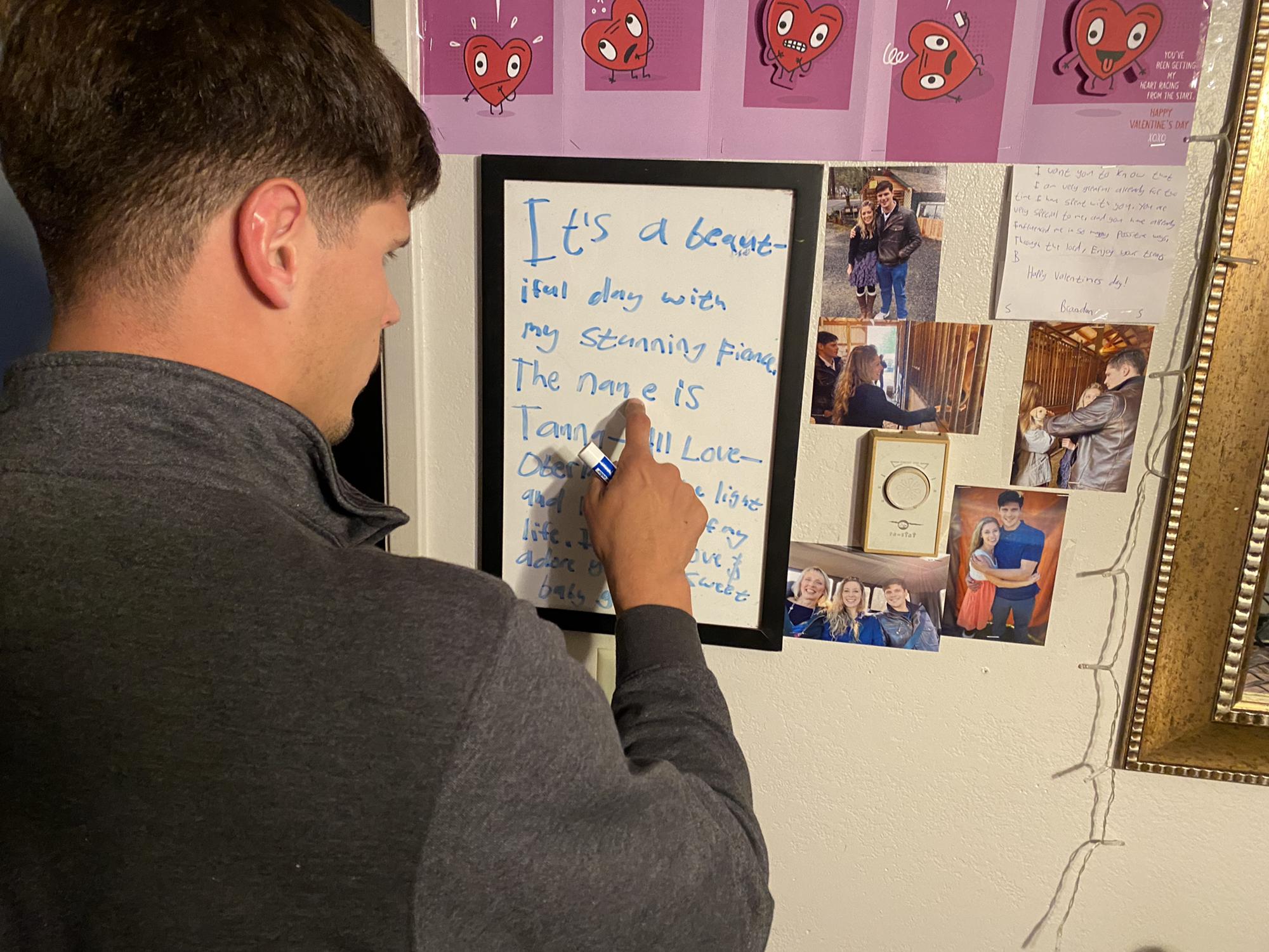 Brandon writes his love messages in her room.