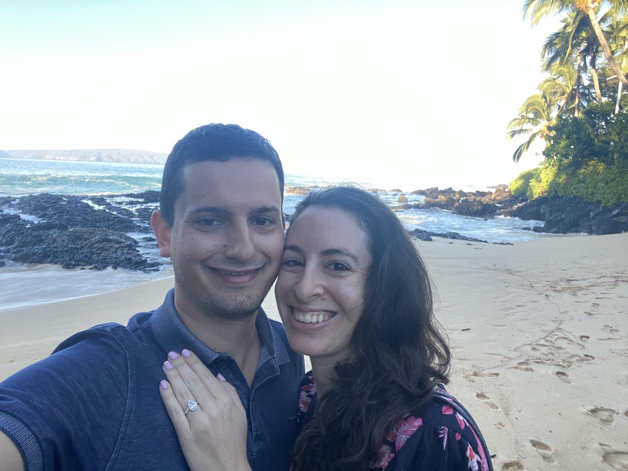 Makena Cove with the happy couple and beautiful ring