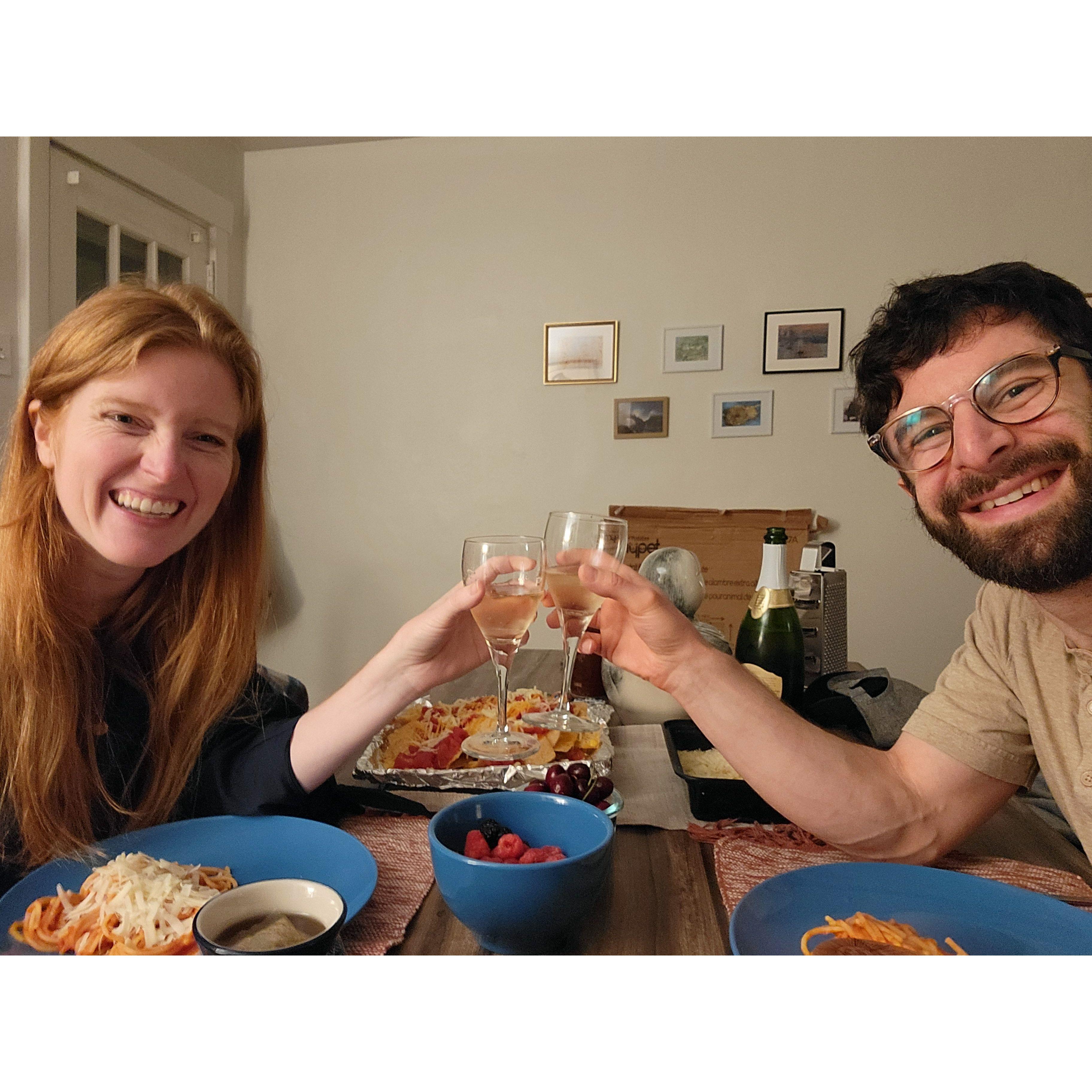 Celebrating New Years together for the first time, with a gourmet, "adulting" meal of spaghetti, nachos and champagne.