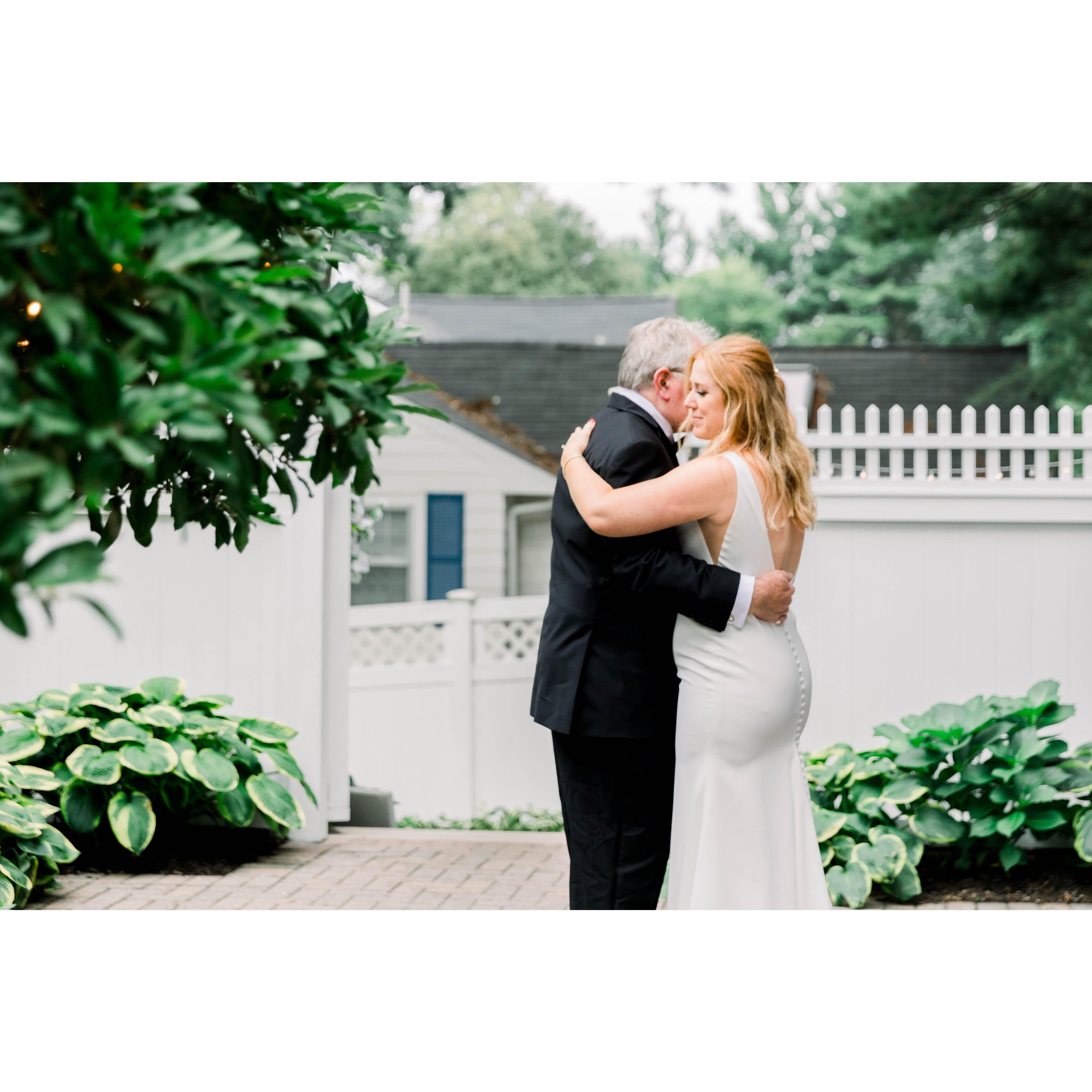 Father/daughter dance to Josh Groban's "Somewhere over the Rainbow". Katie grew up watching the Wizard of Oz with her Dad.