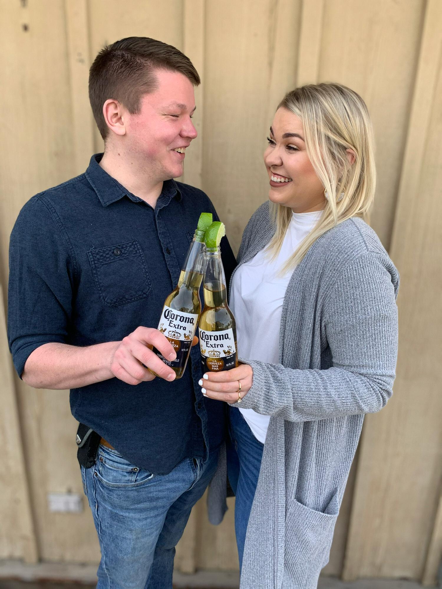 Laughing through the pain of having to reschedule the wedding.